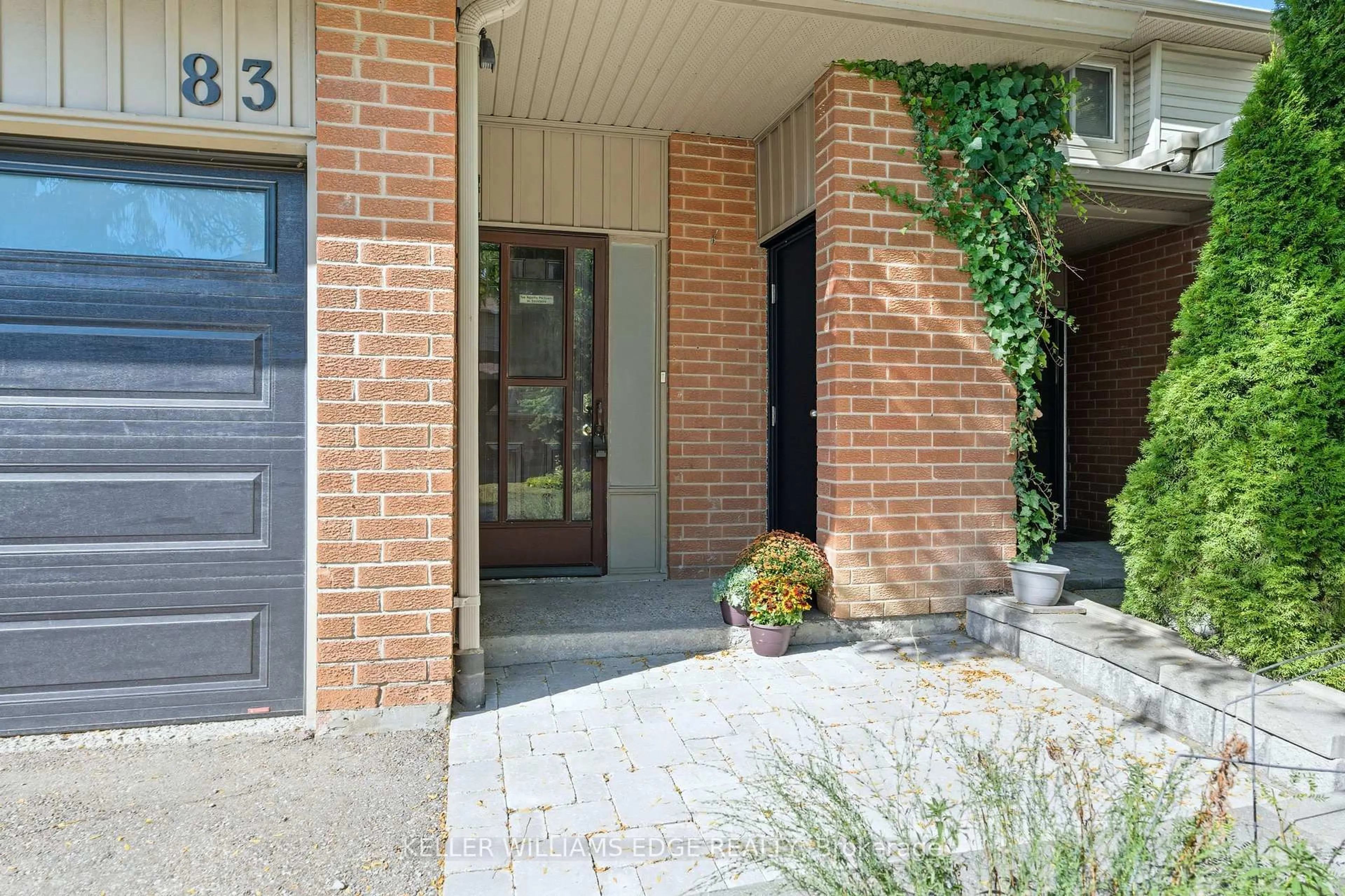Home with brick exterior material, street for 485 Meadows Blvd #83, Mississauga Ontario L4Z 1H1