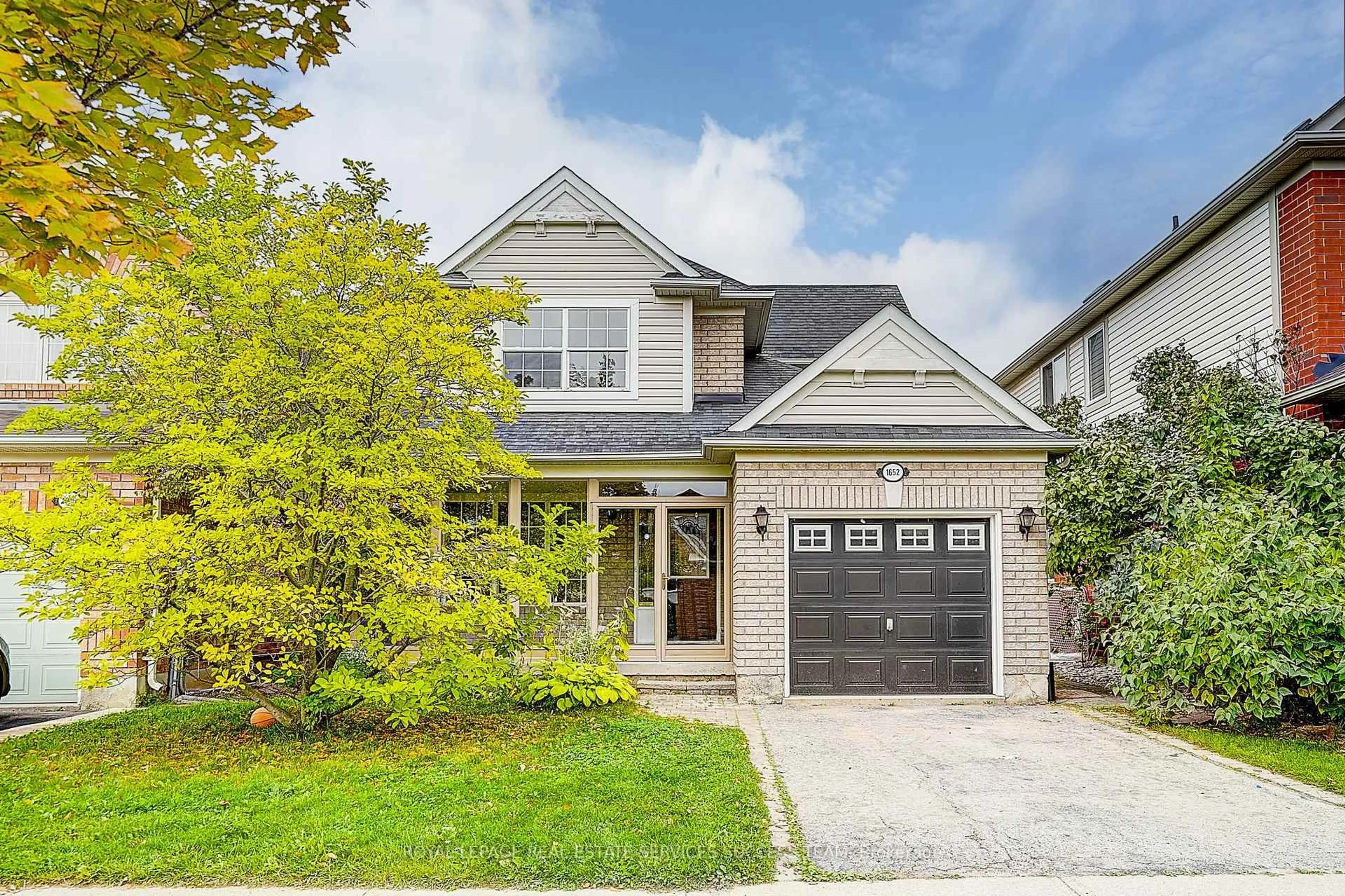 Home with brick exterior material, street for 1652 Beaty Tr, Milton Ontario L9T 5Z7
