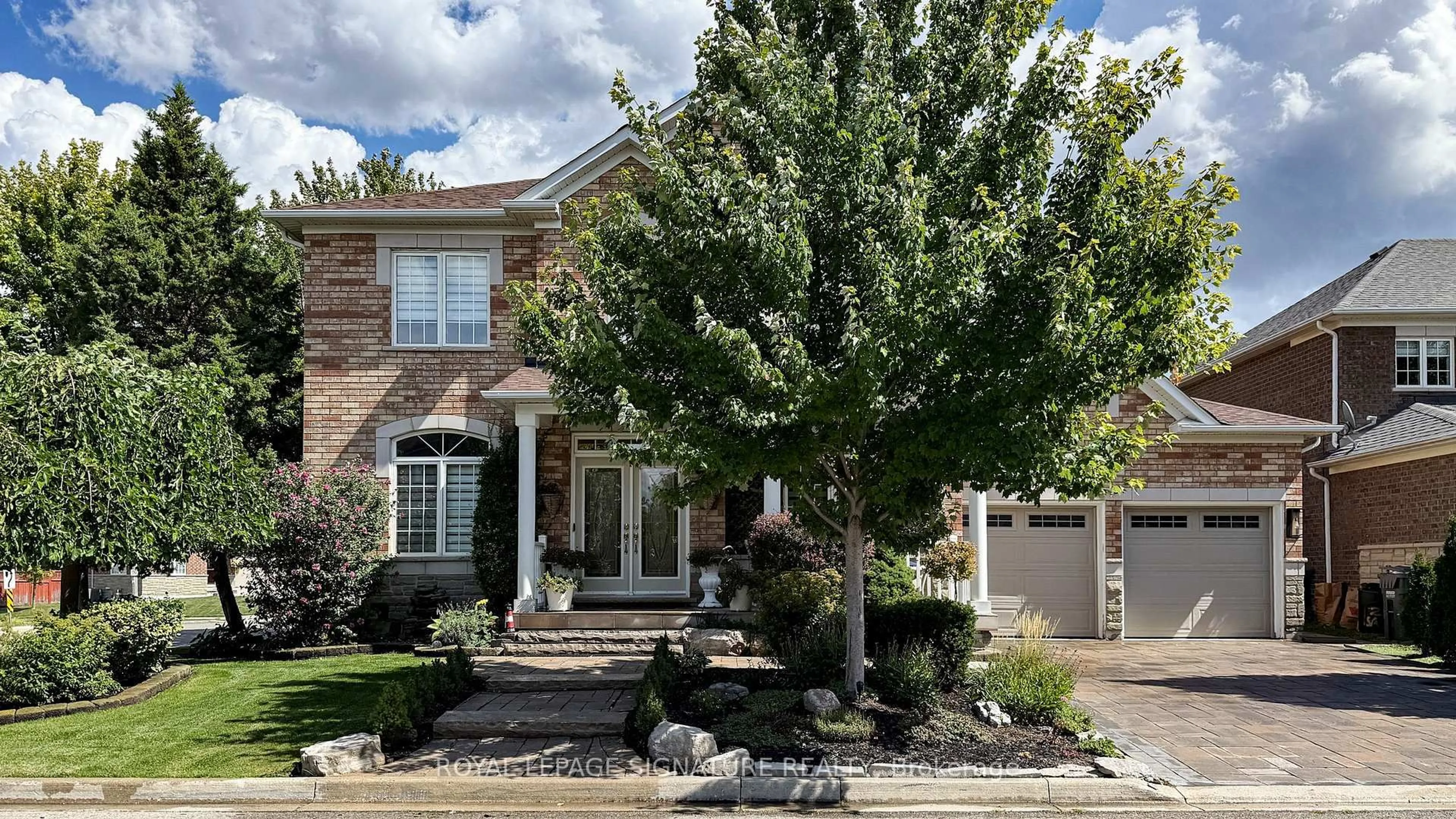 Home with brick exterior material, street for 25 Sawston Circ, Brampton Ontario L7A 2N7