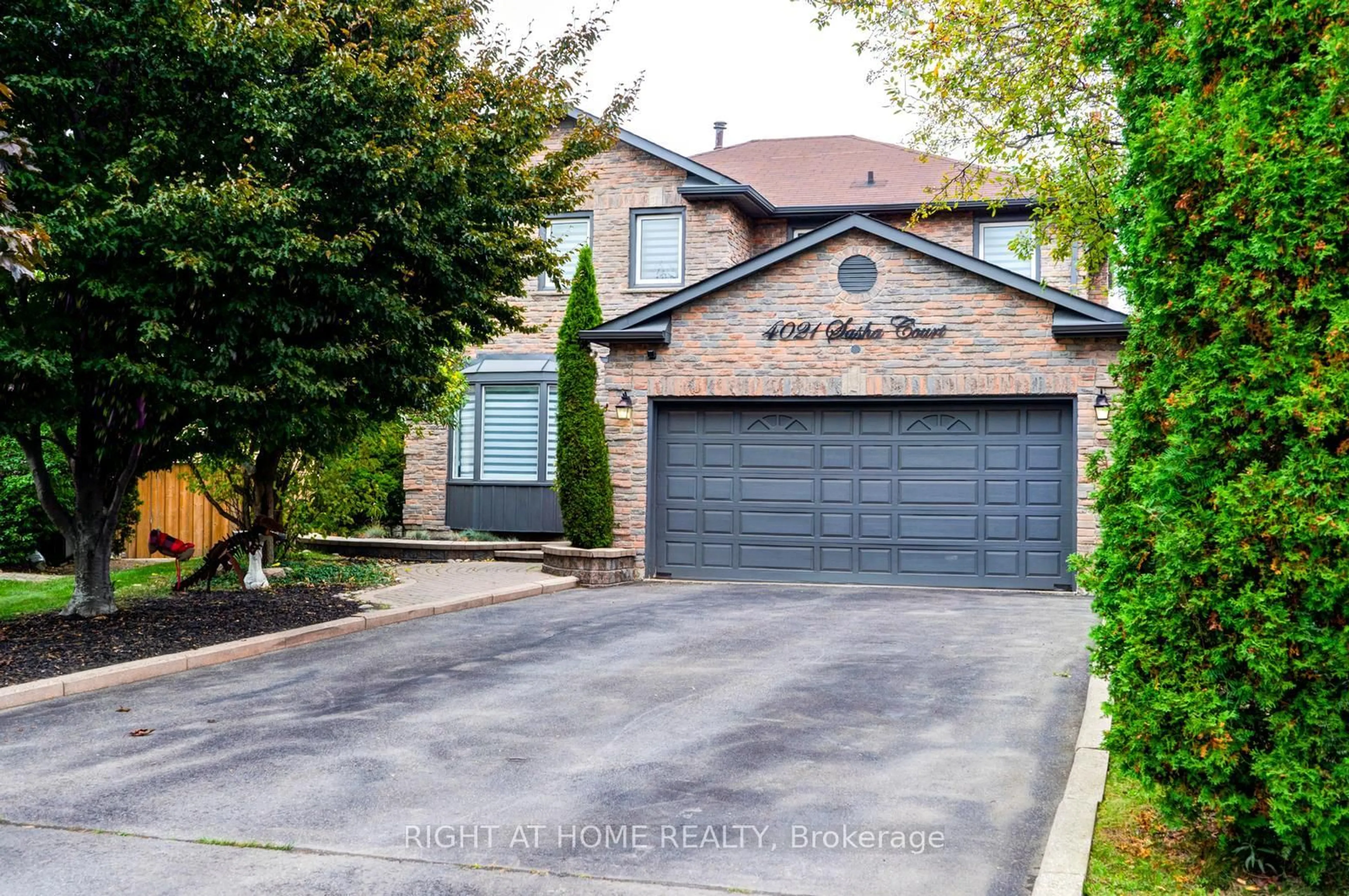 Home with brick exterior material, street for 4021 Sasha Crt, Mississauga Ontario L4W 3K9