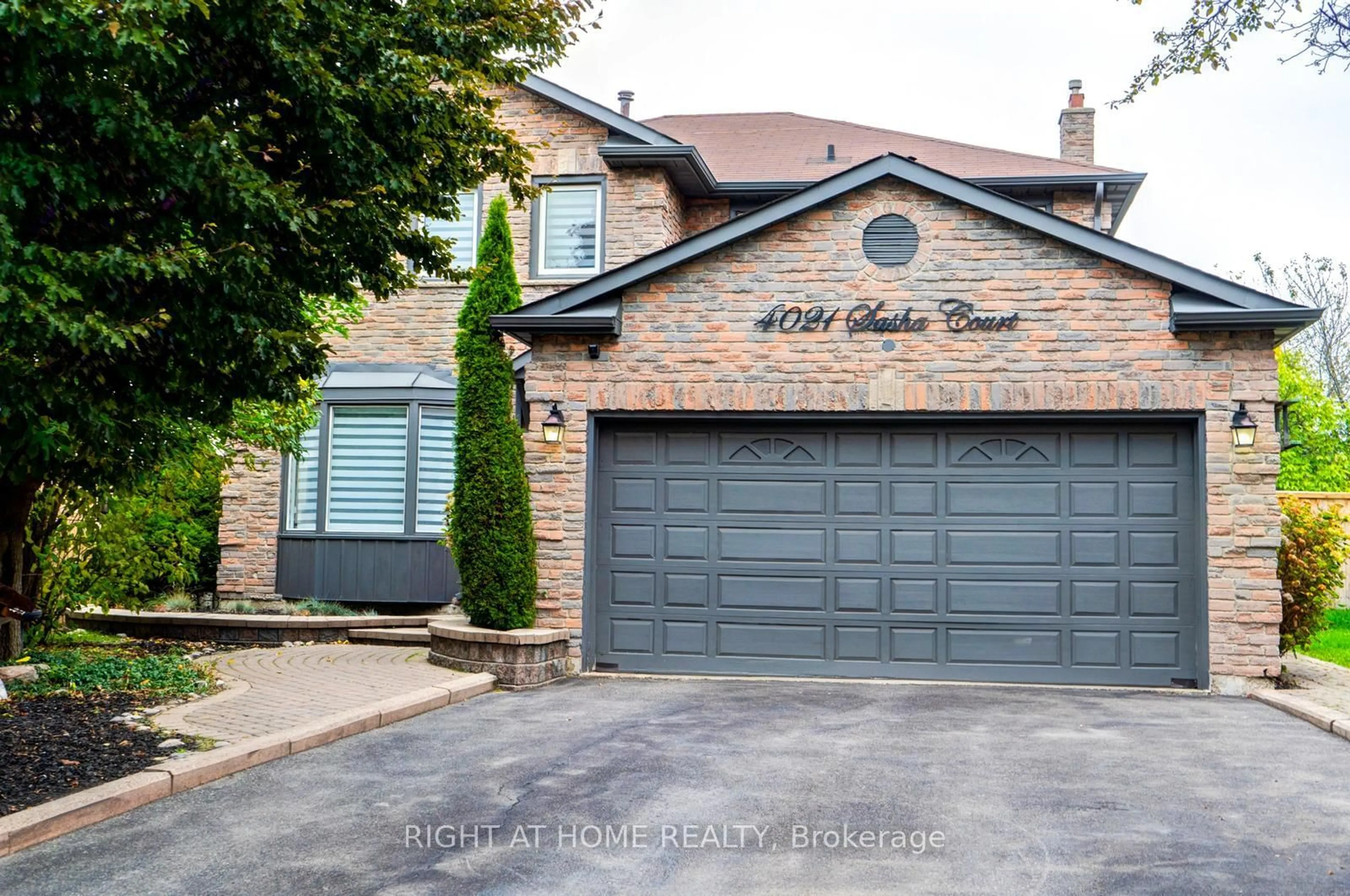 Home with brick exterior material, street for 4021 Sasha Crt, Mississauga Ontario L4W 3K9