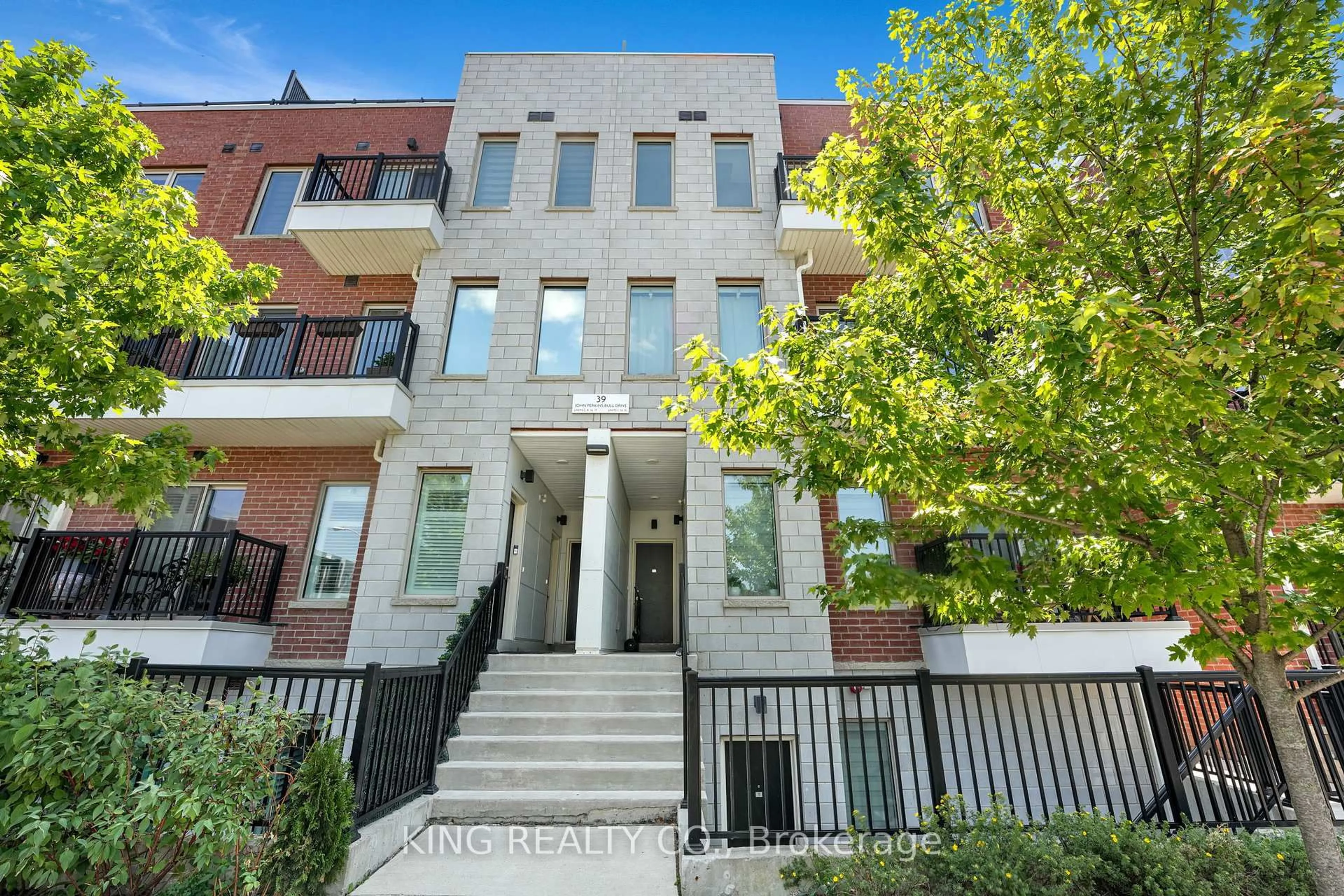 Home with brick exterior material, street for 39 John Perkins Bull Dr #14, Toronto Ontario M3K 0C3