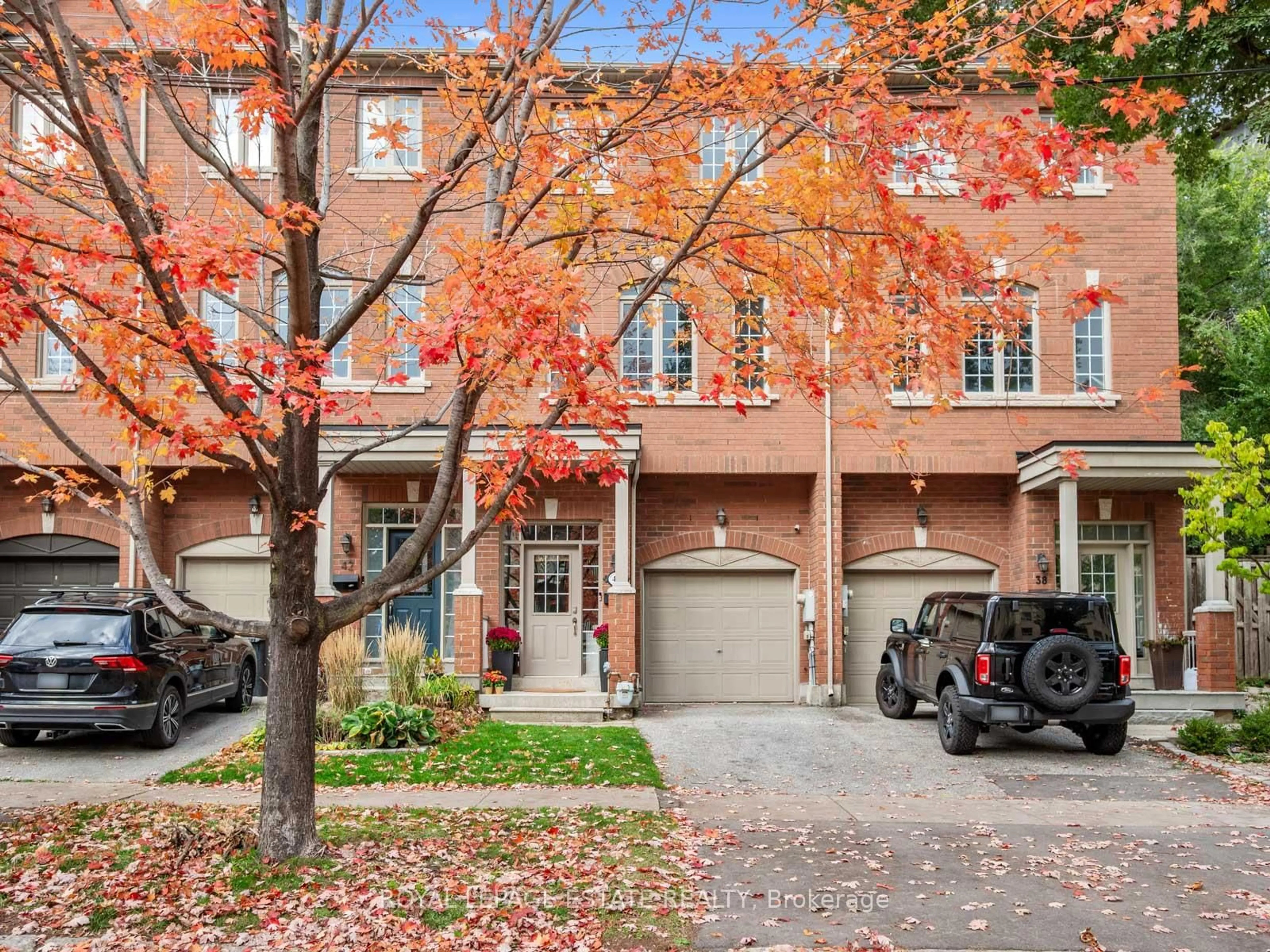 Home with brick exterior material, street for 40 Bell Manor Dr, Toronto Ontario M8Y 0A4