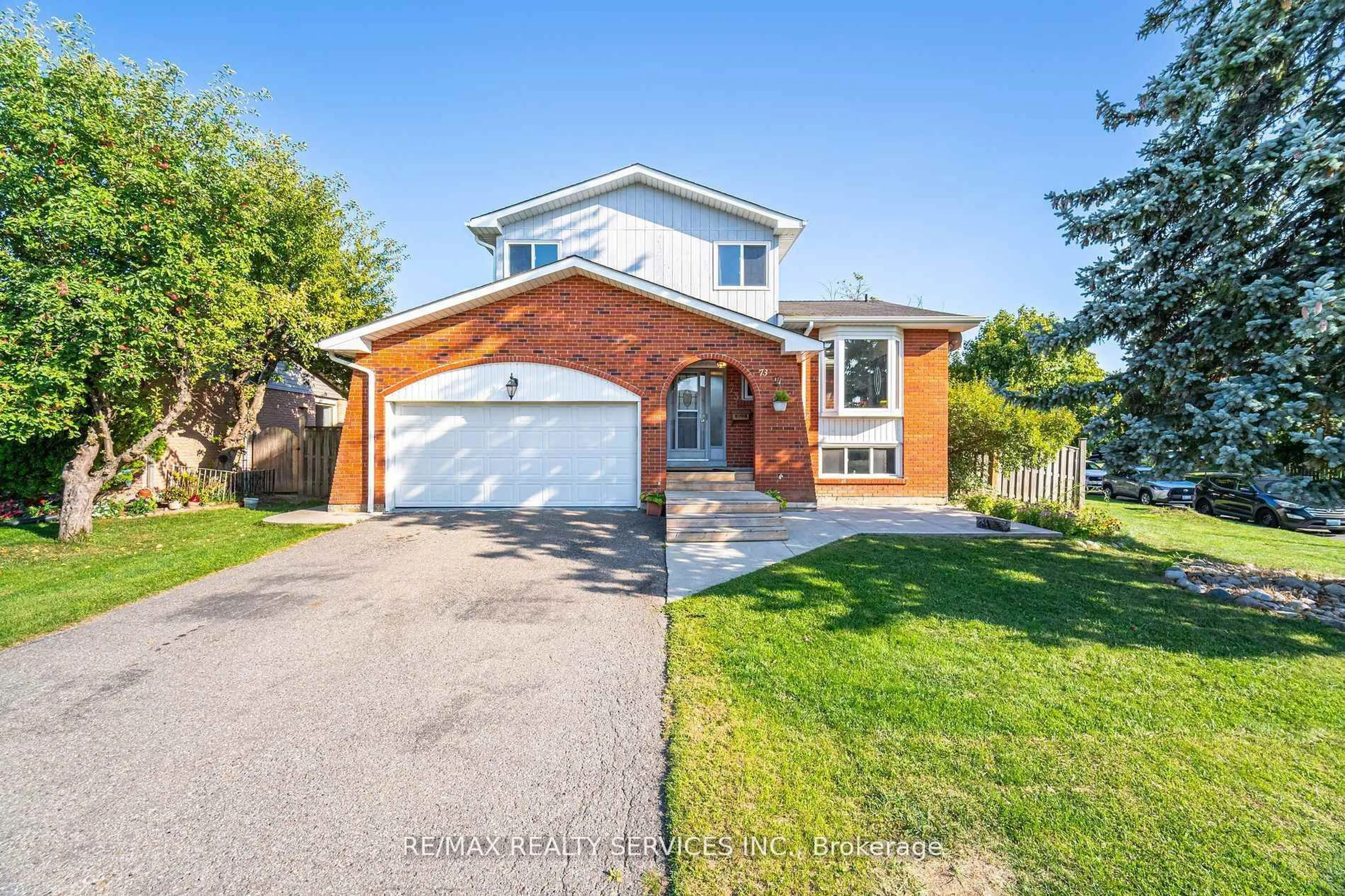 Home with brick exterior material, street for 73 Blackthorn Lane, Brampton Ontario L6V 3K9