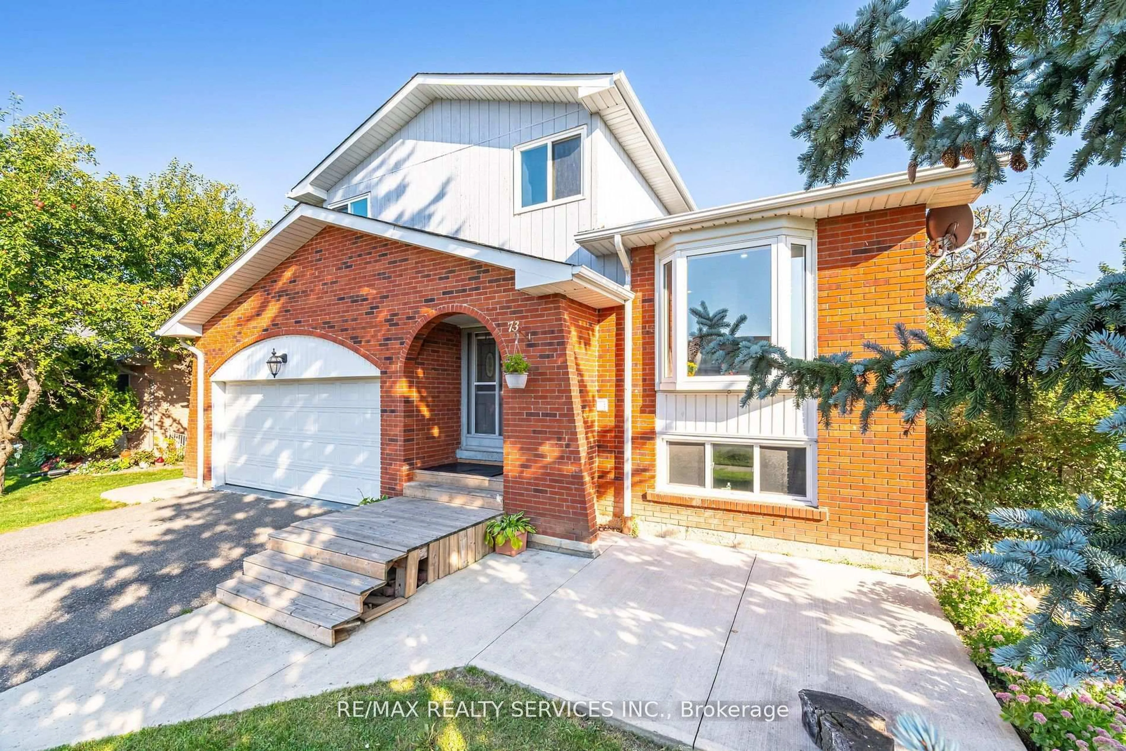 Home with brick exterior material, street for 73 Blackthorn Lane, Brampton Ontario L6V 3K9