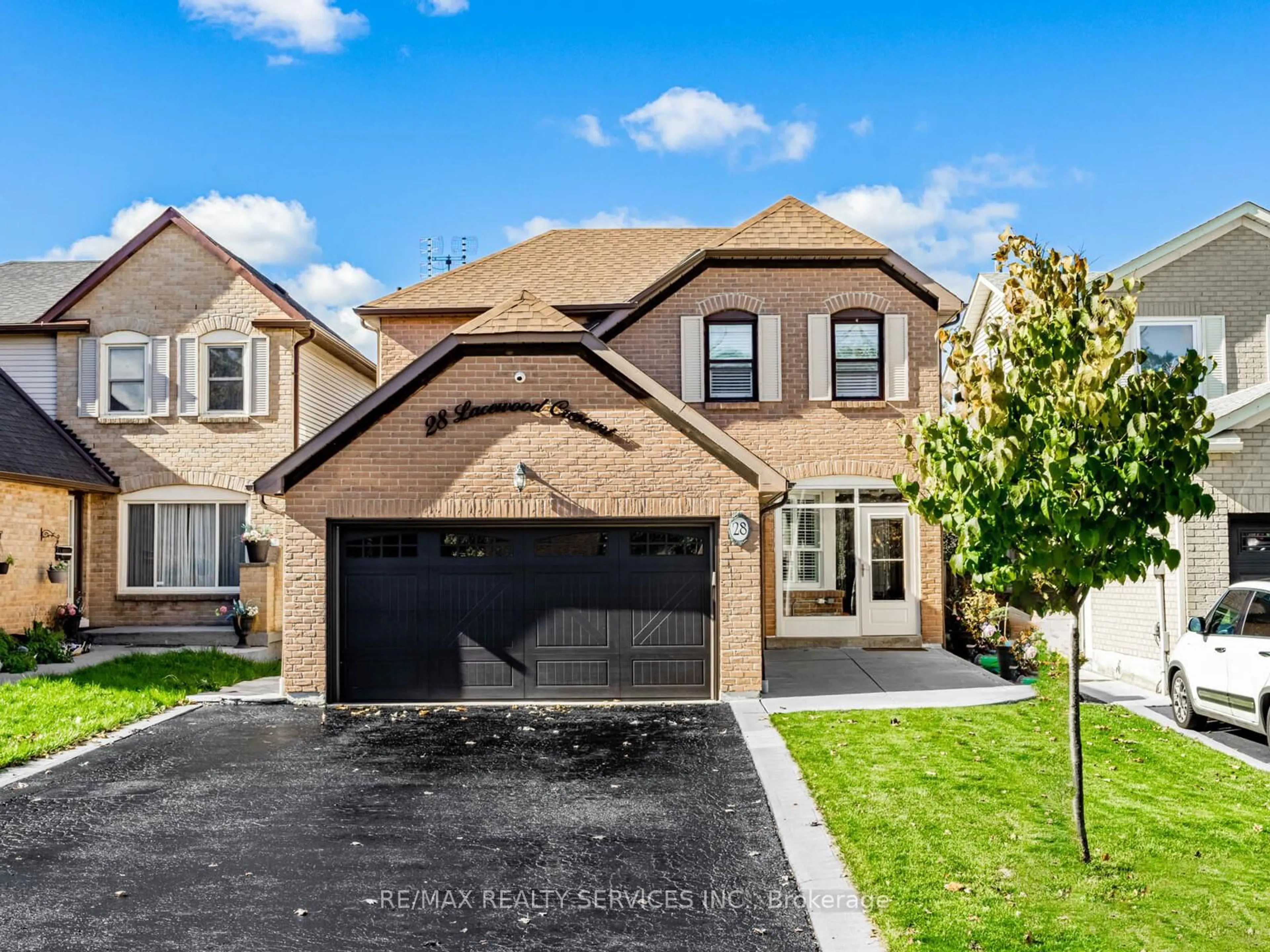 Home with brick exterior material, street for 28 Lacewood Cres, Brampton Ontario L6S 3K4