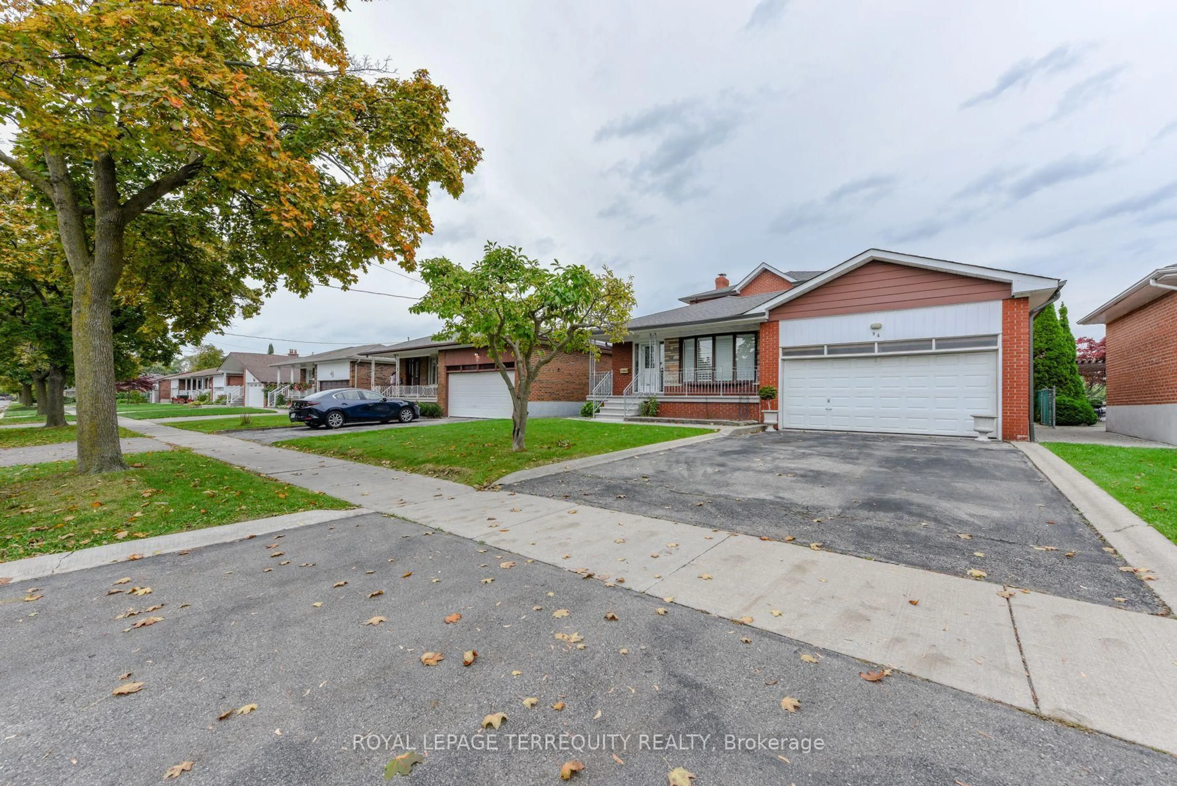 A pic from outside/outdoor area/front of a property/back of a property/a pic from drone, street for 94 Melbert Rd, Toronto Ontario M9C 3R1