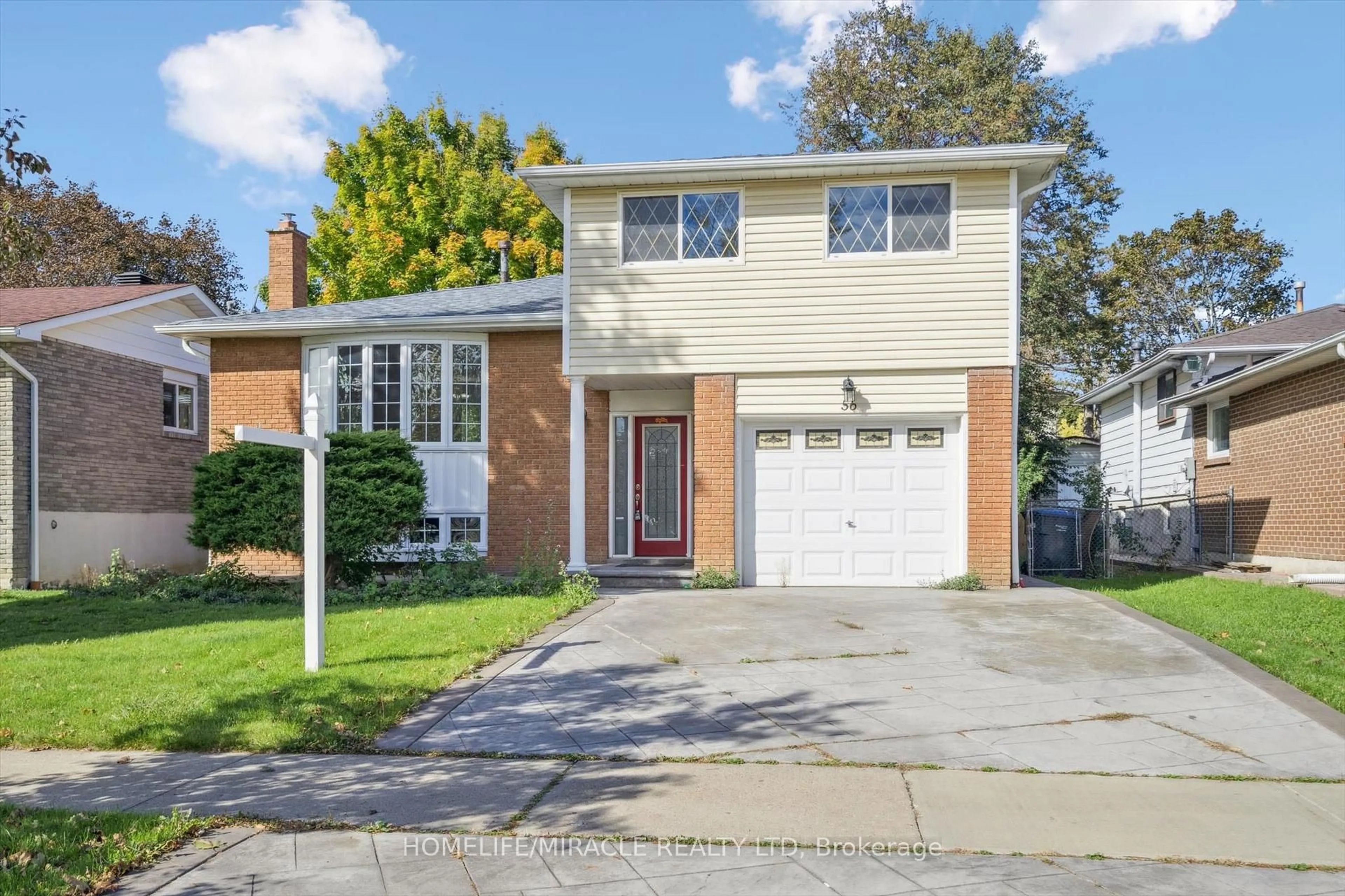 Home with brick exterior material, street for 56 Elgin Dr, Brampton Ontario L6Y 1A8