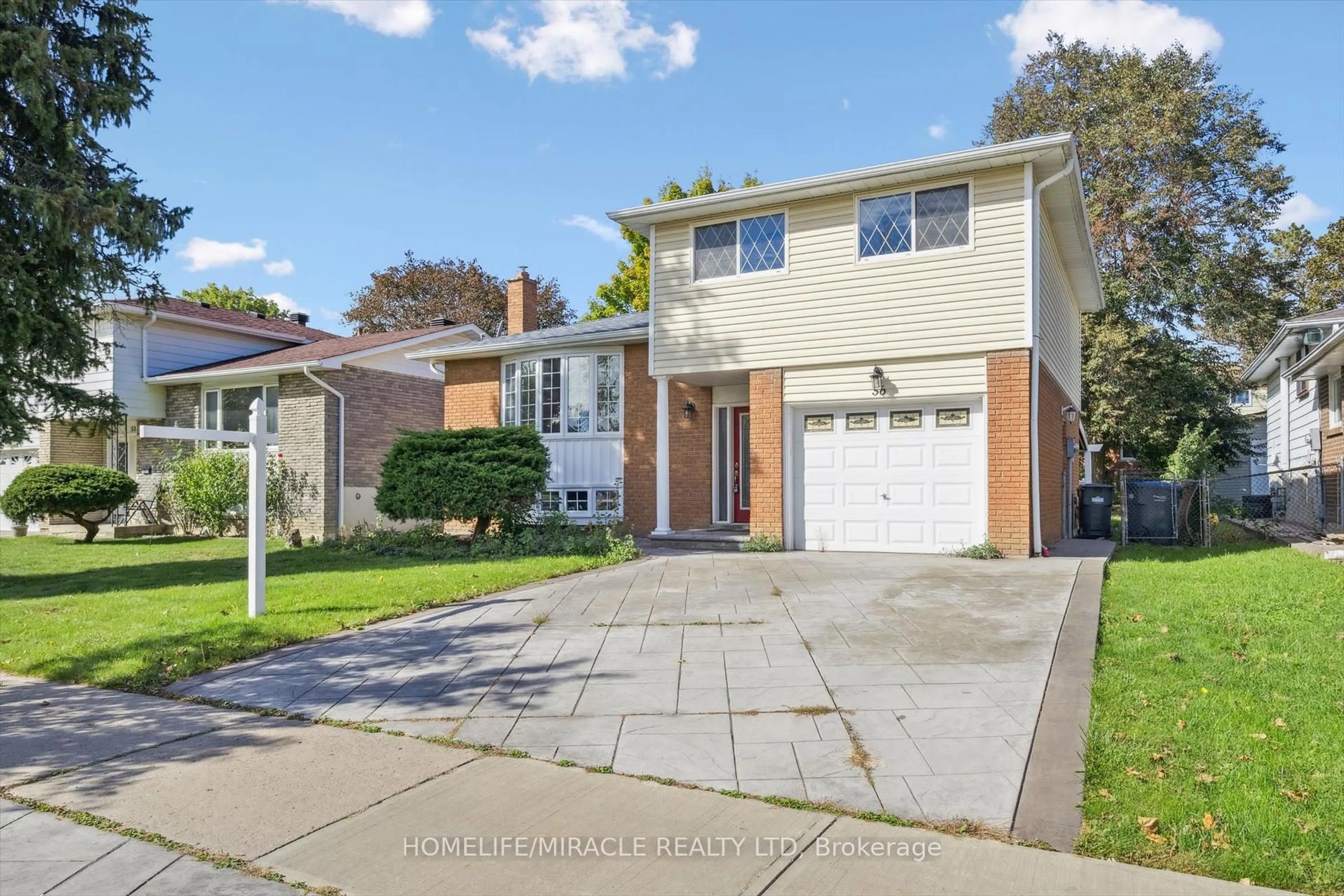 Home with brick exterior material, street for 56 Elgin Dr, Brampton Ontario L6Y 1A8