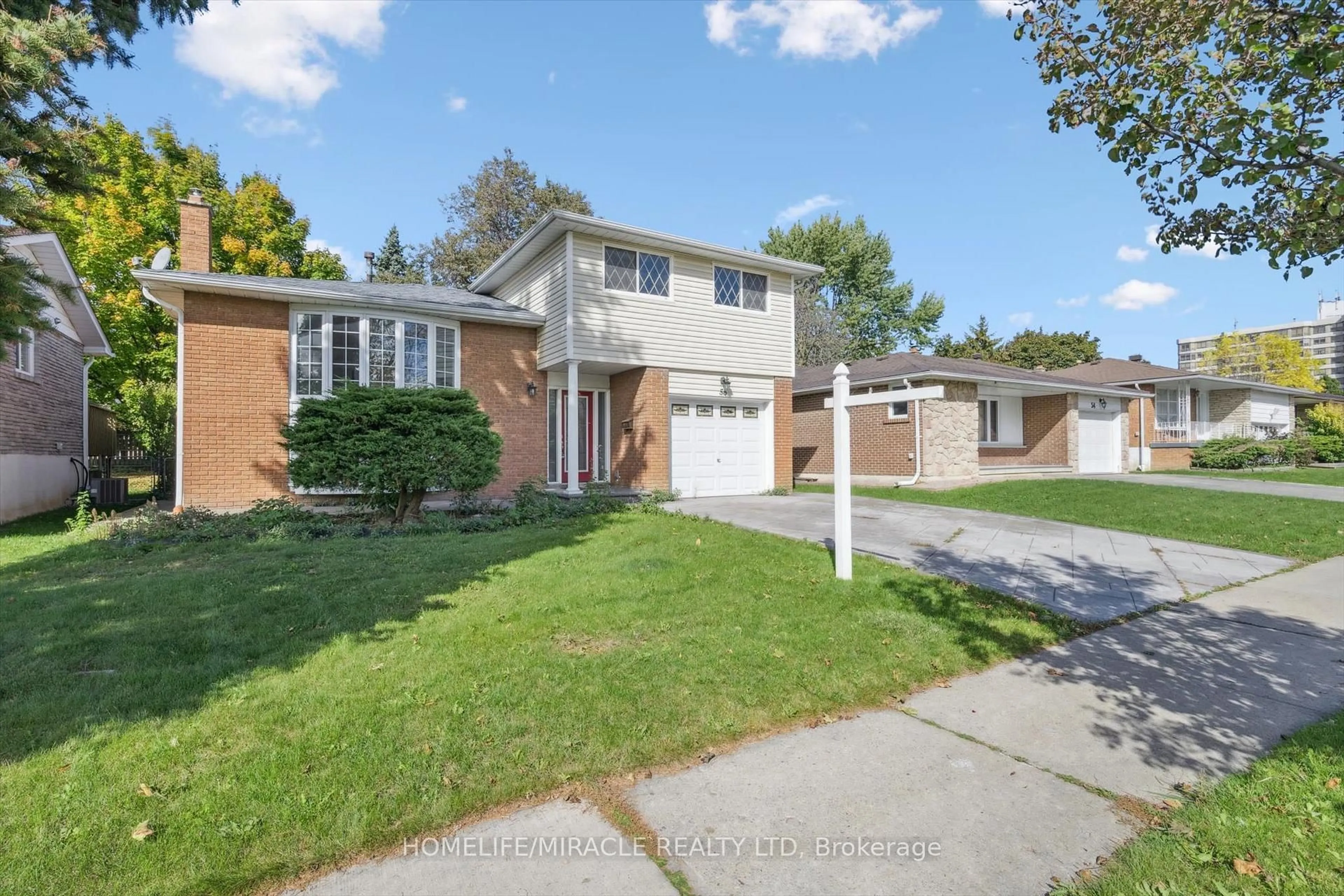 Home with brick exterior material, street for 56 Elgin Dr, Brampton Ontario L6Y 1A8