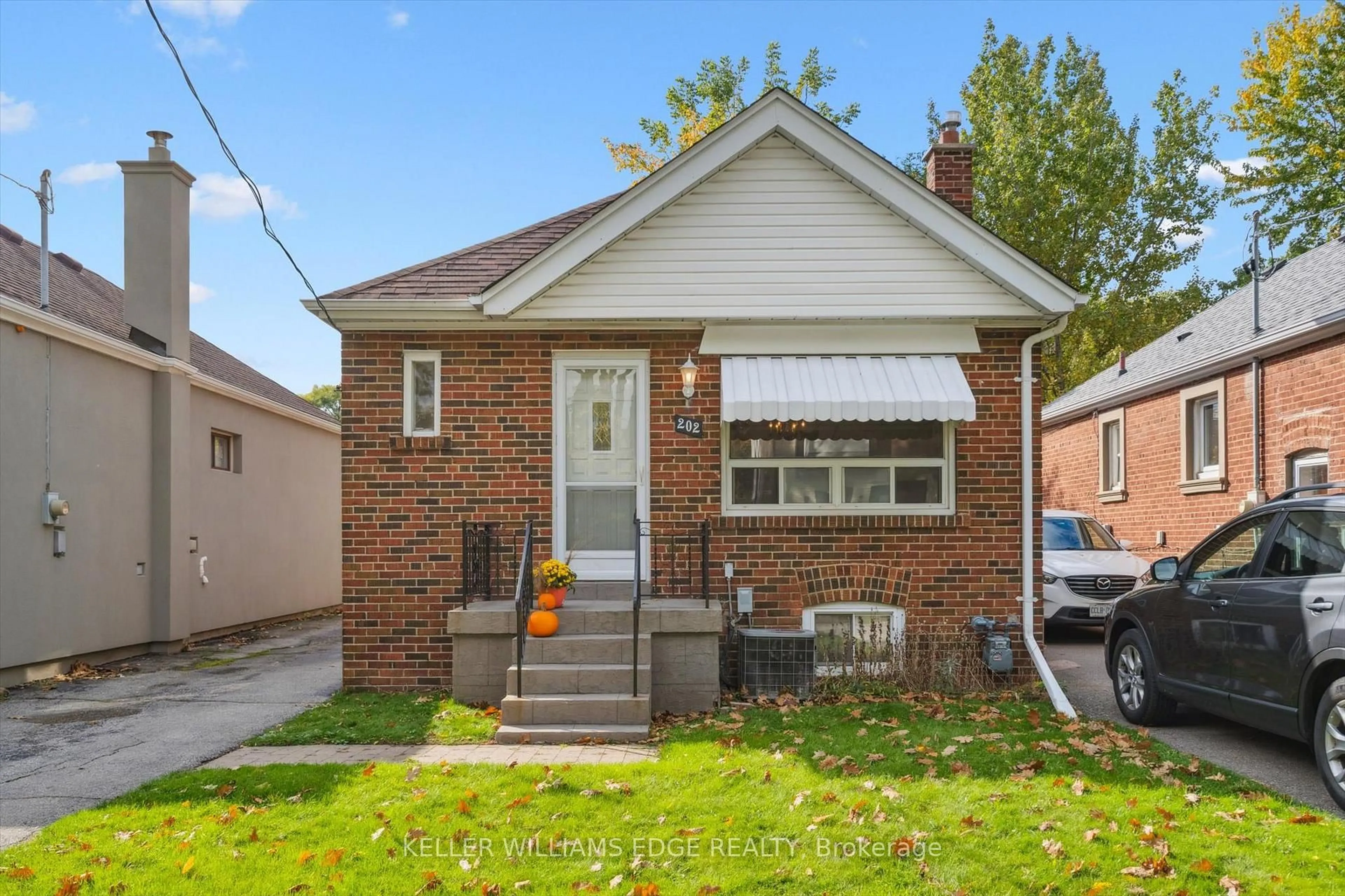 Home with brick exterior material, street for 202 Alderbrae Ave, Toronto Ontario M8W 4K5