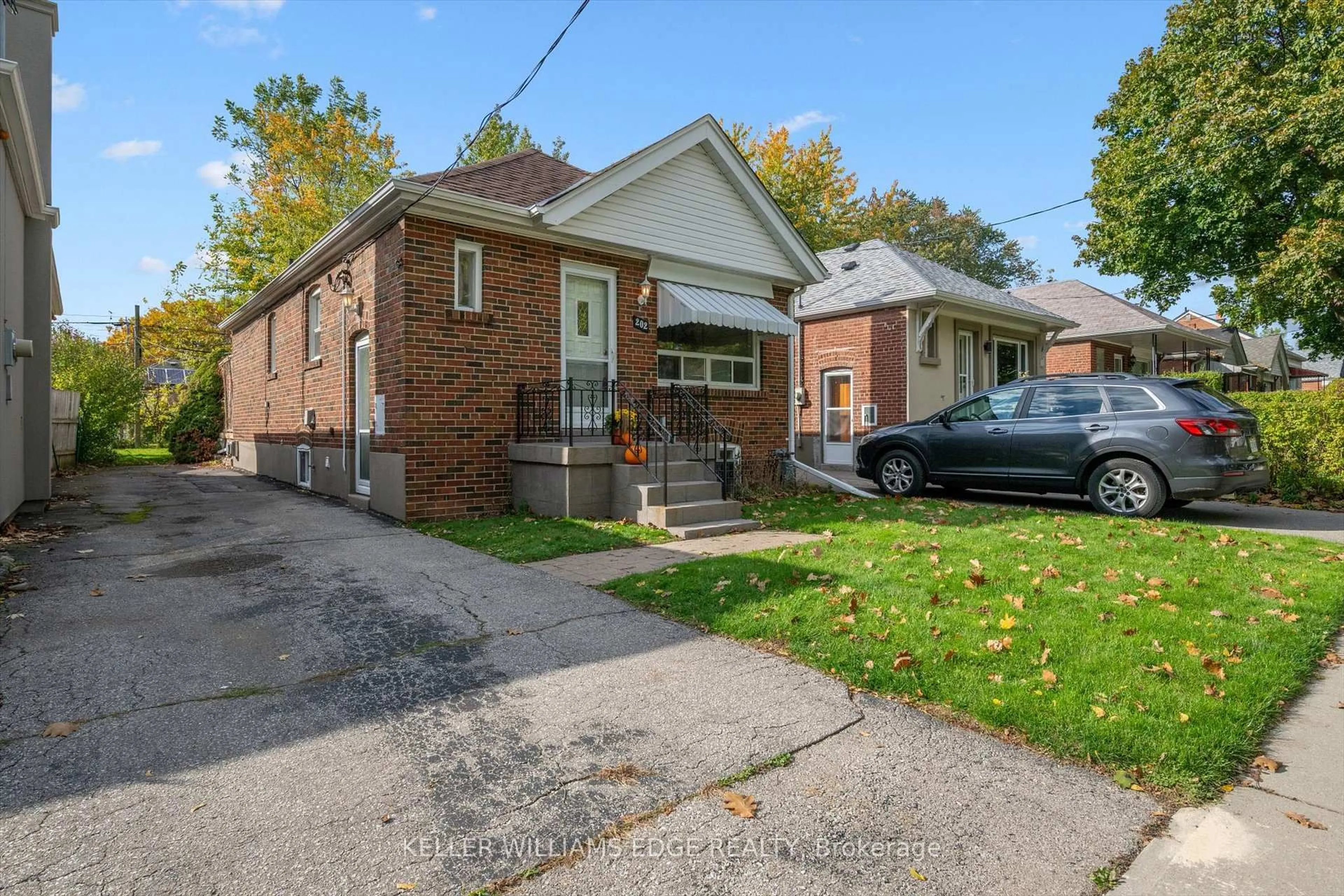 Home with brick exterior material, street for 202 Alderbrae Ave, Toronto Ontario M8W 4K5