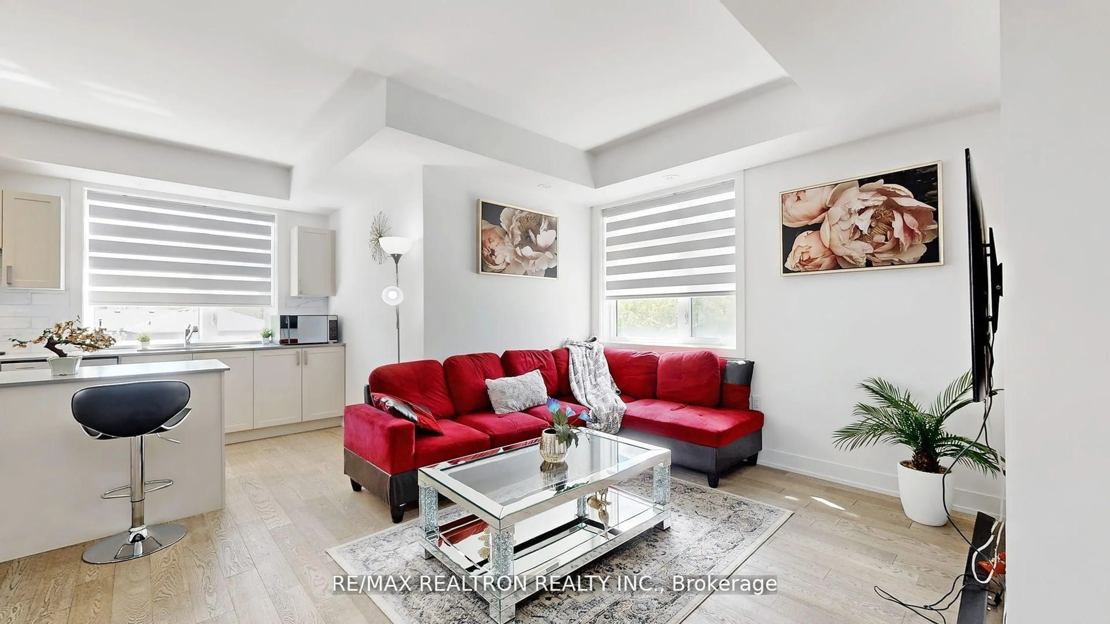 Living room with furniture, ceramic/tile floor for 1070 Douglas Mccurdy Common #217, Mississauga Ontario L5G 0C6