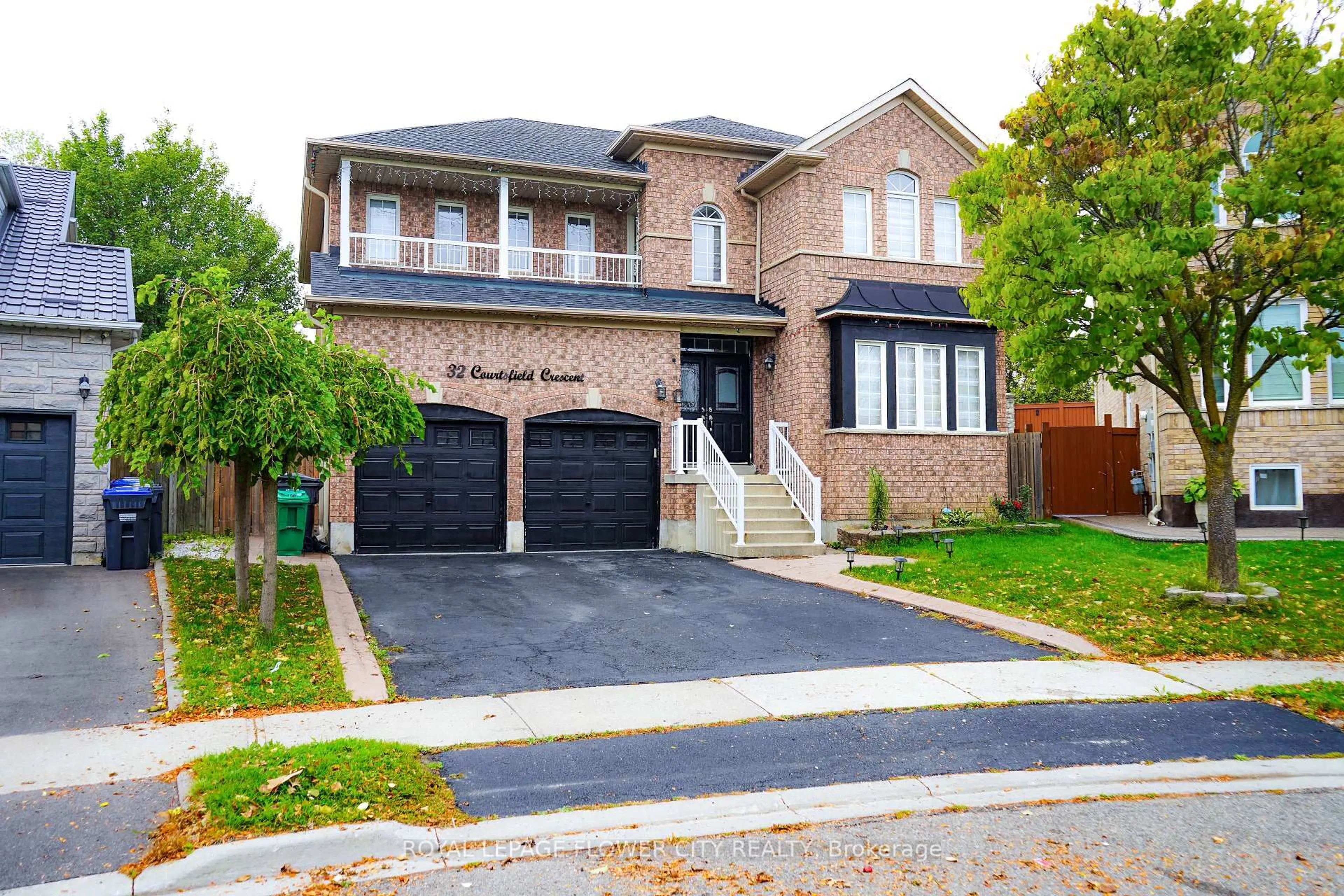 Home with brick exterior material, street for 32 Courtsfield Cres, Brampton Ontario L7A 2E2