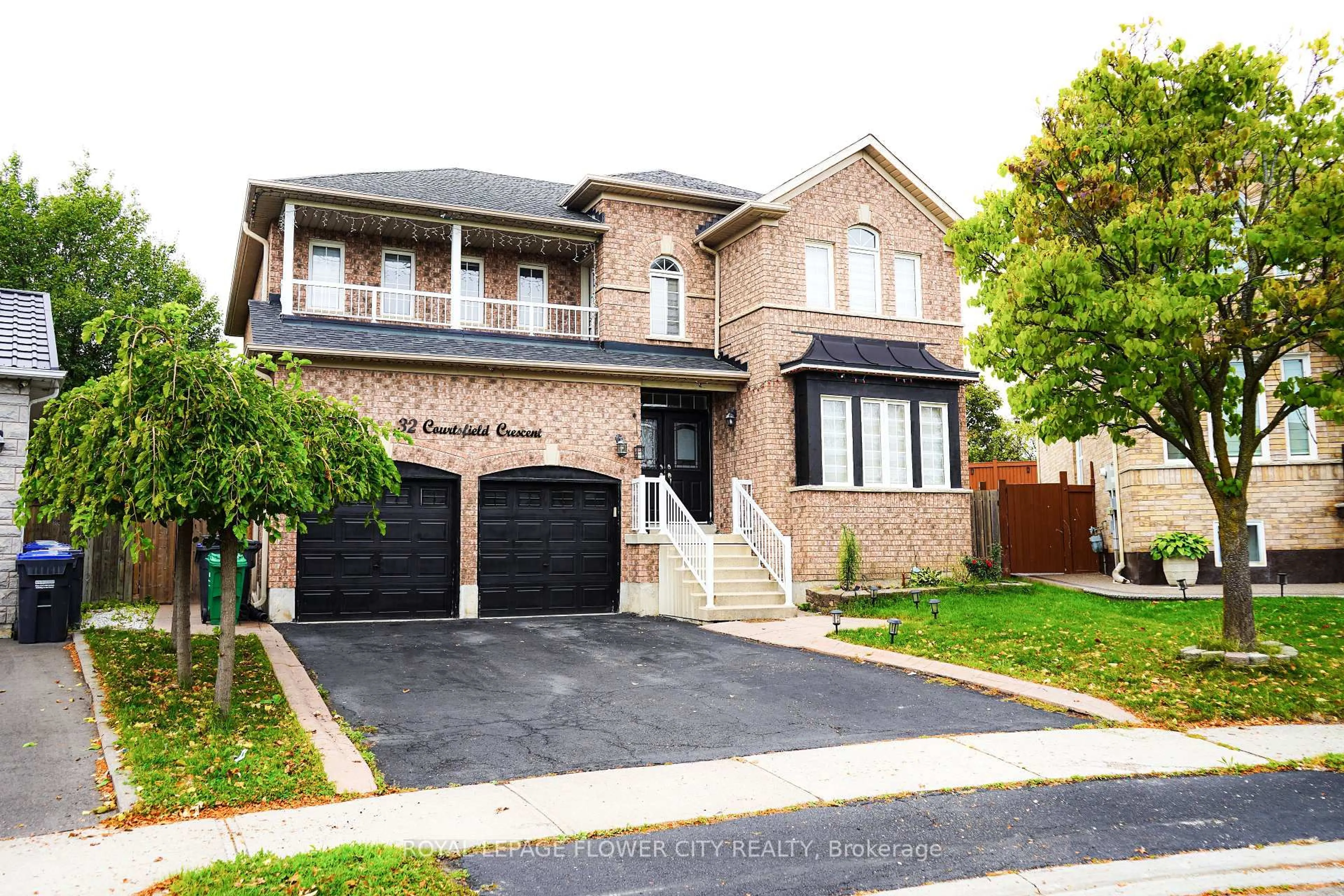 Home with brick exterior material, street for 32 Courtsfield Cres, Brampton Ontario L7A 2E2