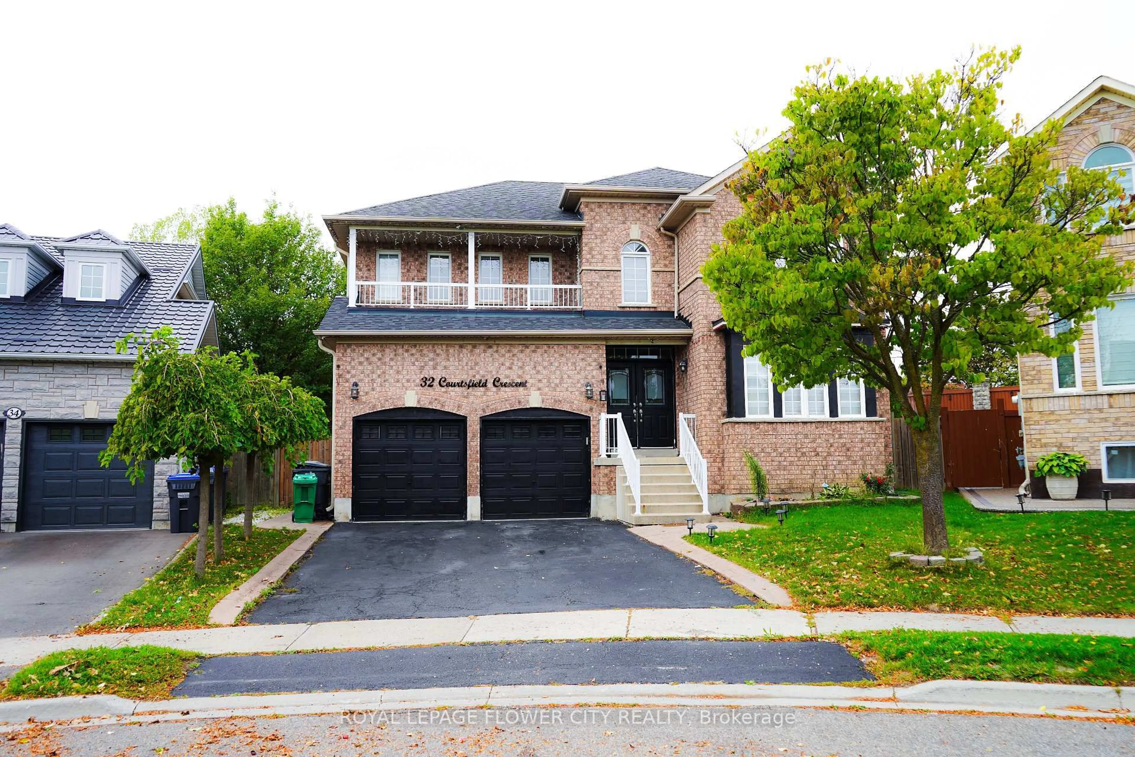 Home with brick exterior material, street for 32 Courtsfield Cres, Brampton Ontario L7A 2E2