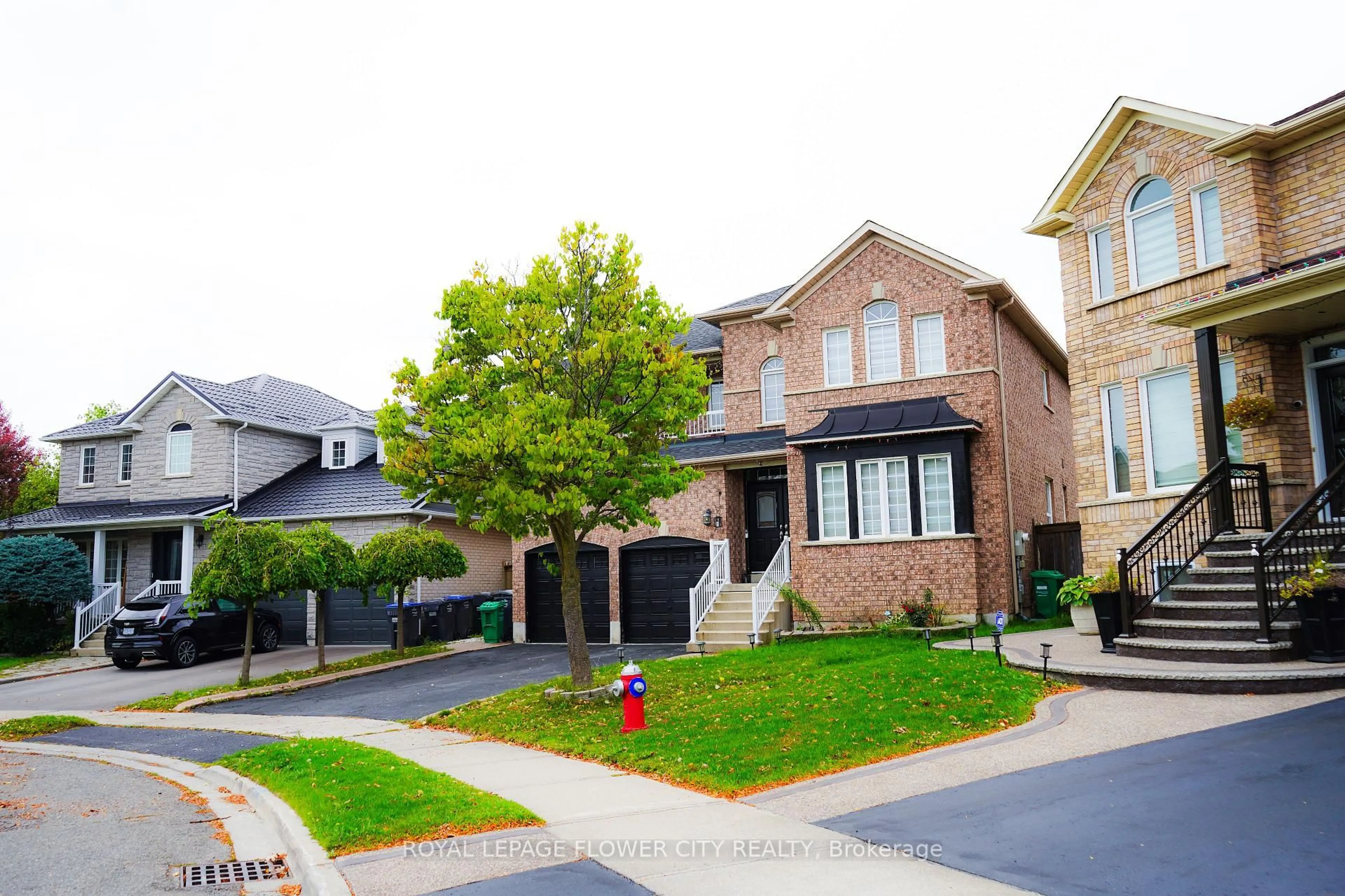 Home with brick exterior material, street for 32 Courtsfield Cres, Brampton Ontario L7A 2E2