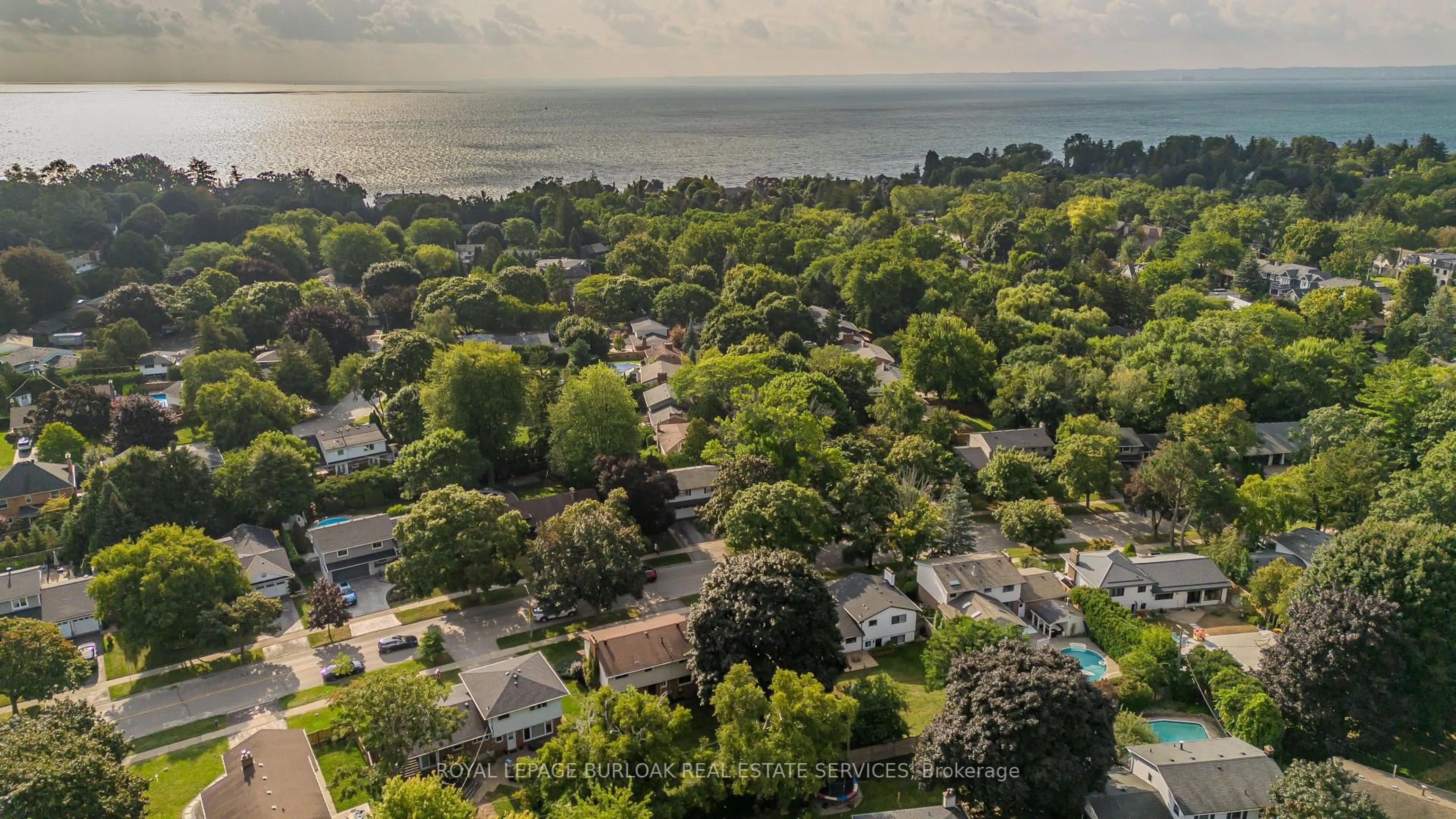 A pic from outside/outdoor area/front of a property/back of a property/a pic from drone, water/lake/river/ocean view for 3457 Spruce Ave, Burlington Ontario L7N 1K2