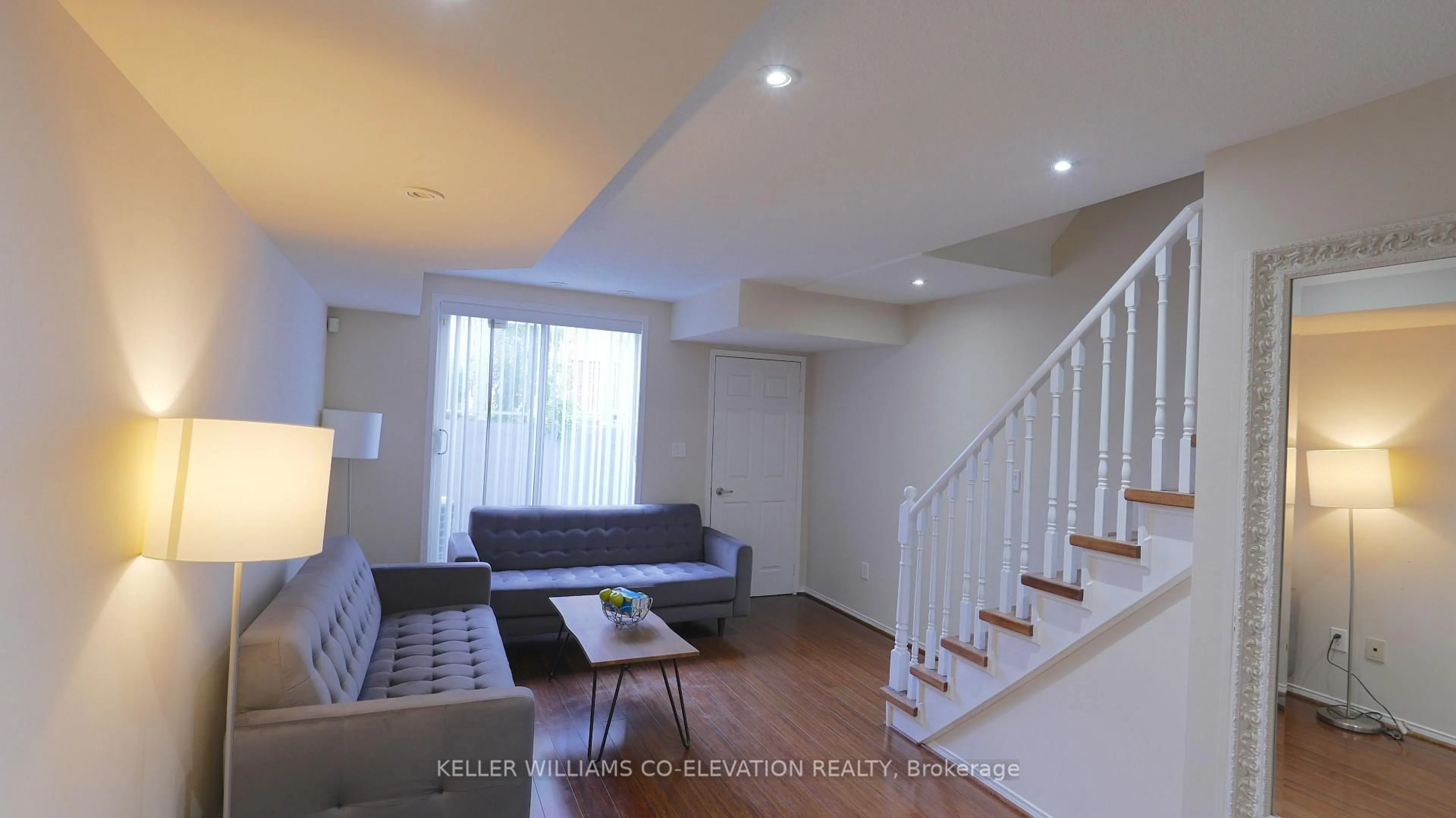 Living room with furniture, wood/laminate floor for 25 Foundry Ave #Unit 13, Toronto Ontario M6H 4K7