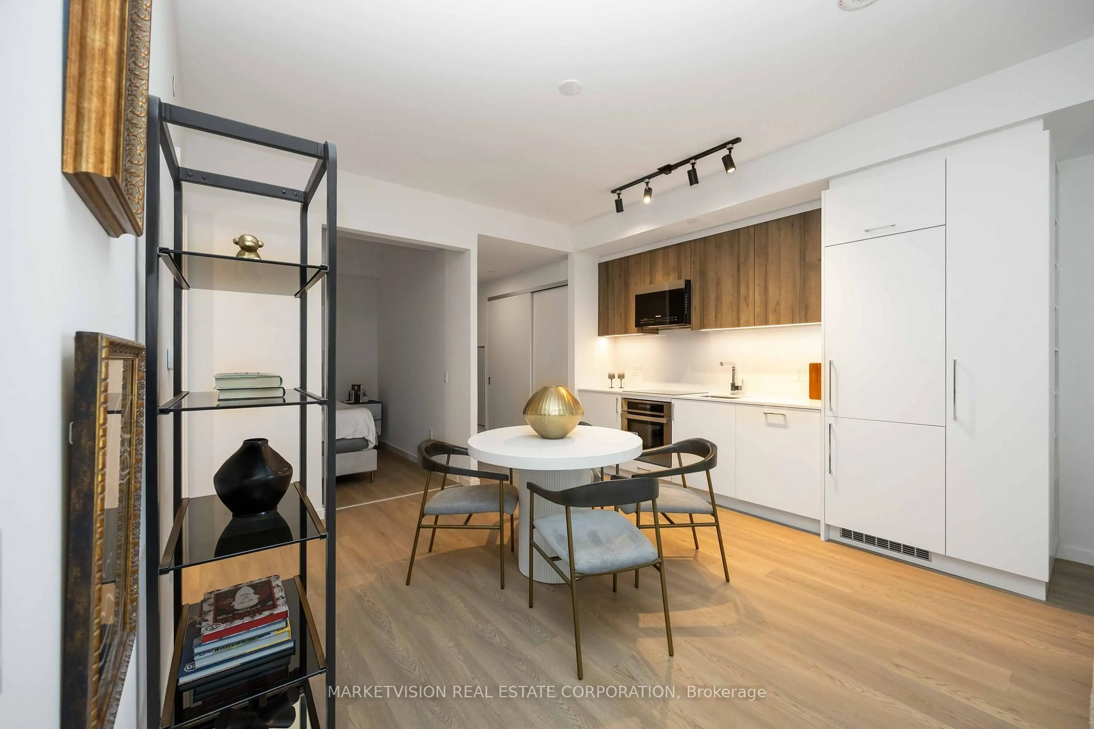 Open concept kitchen, wood/laminate floor for 689 The Queensway #604, Toronto Ontario M8Y 1L1