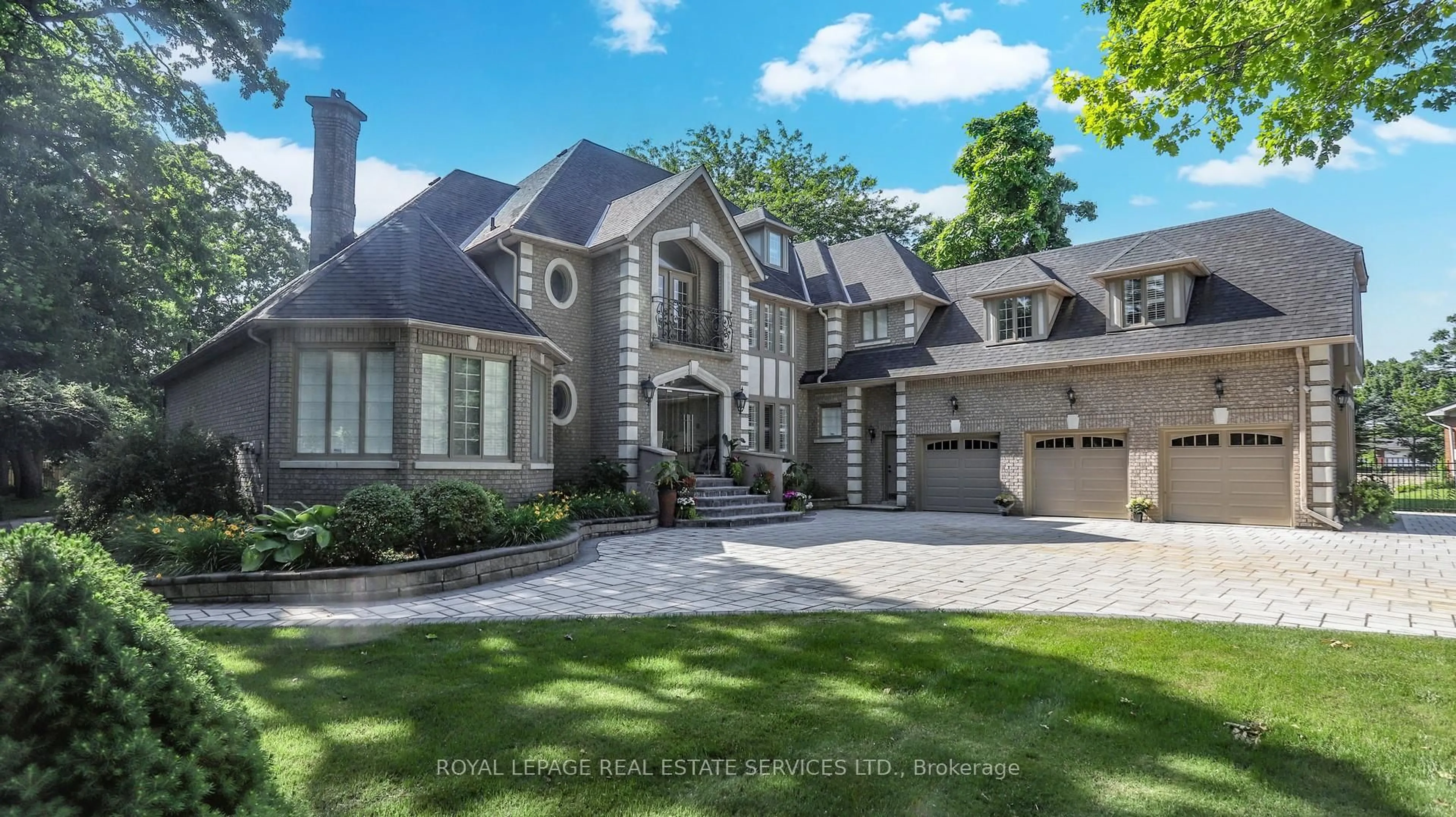 Home with brick exterior material, street for 2416 Mississauga Rd, Mississauga Ontario L5H 2L1