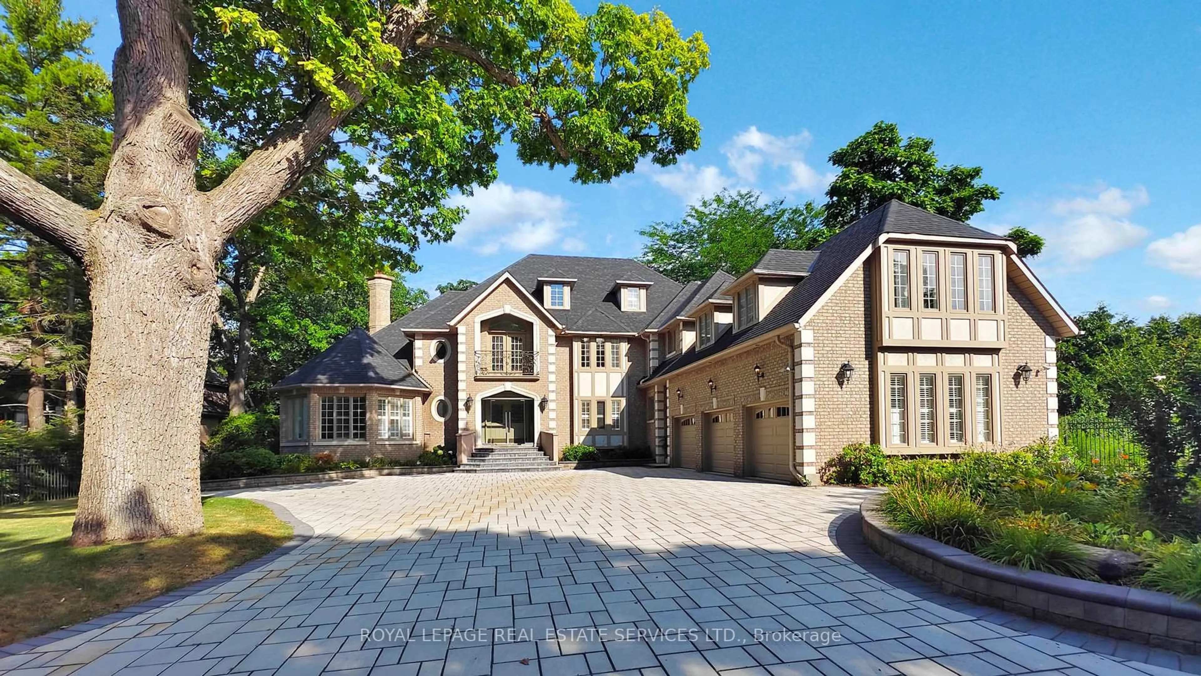 Home with brick exterior material, street for 2416 Mississauga Rd, Mississauga Ontario L5H 2L1