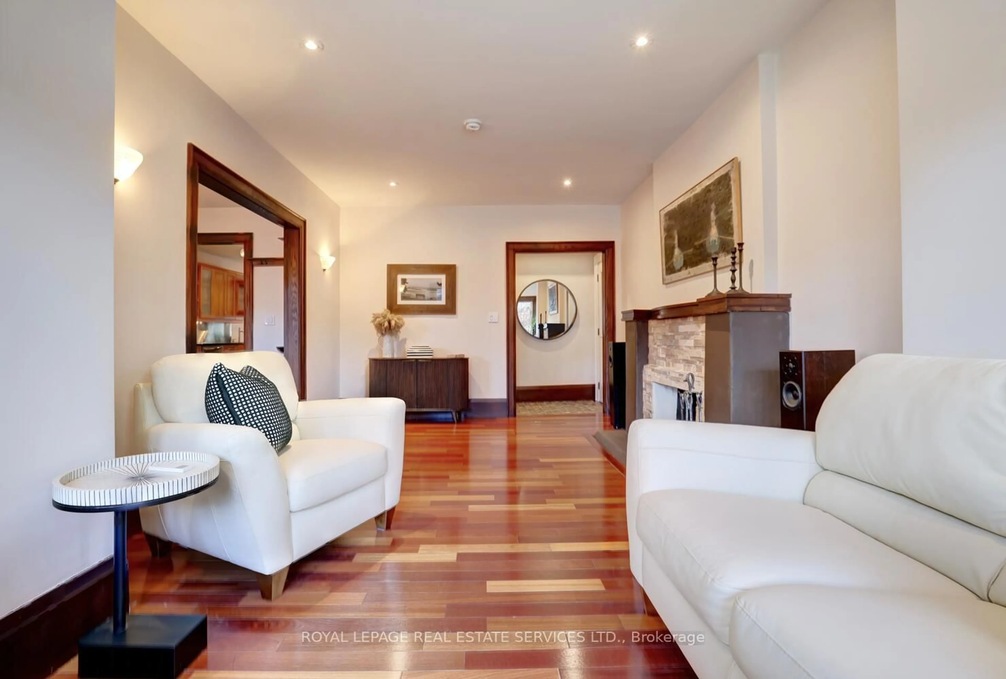 Living room with furniture, wood/laminate floor for 63 Eastbourne Cres, Toronto Ontario M8V 1W7