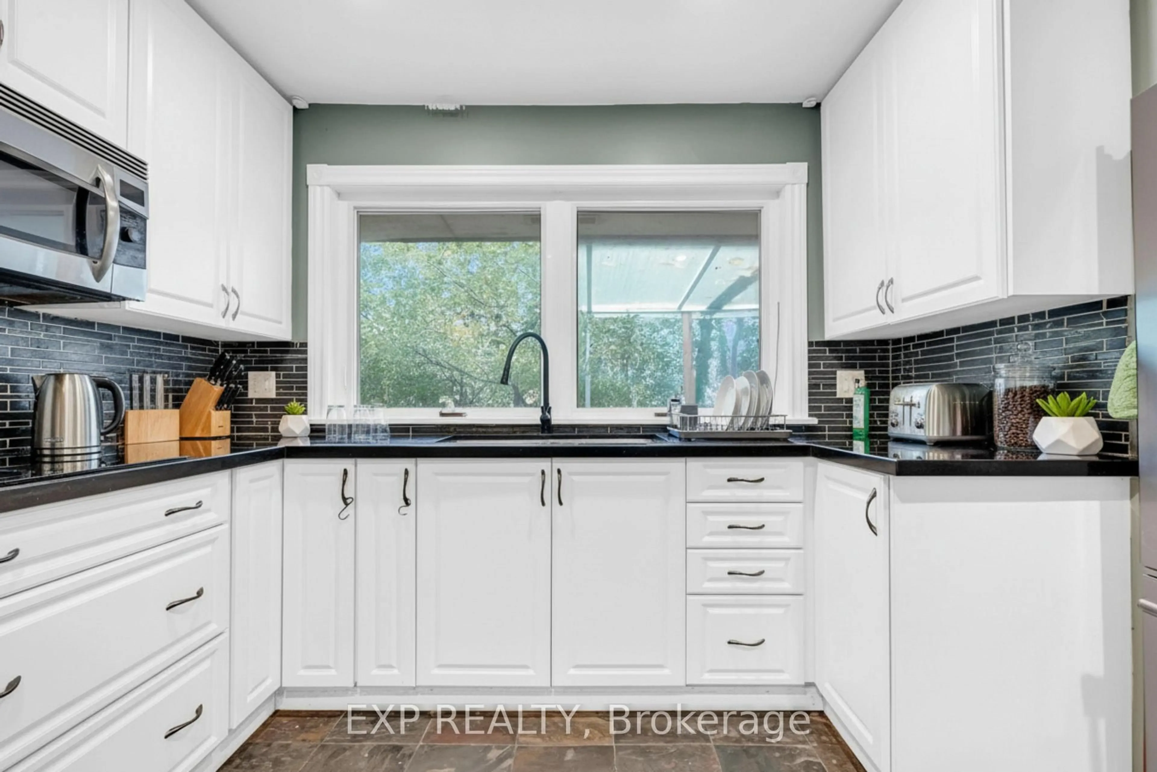 Contemporary kitchen, ceramic/tile floor for 3 Harrow St, Mississauga Ontario L4T 1J2