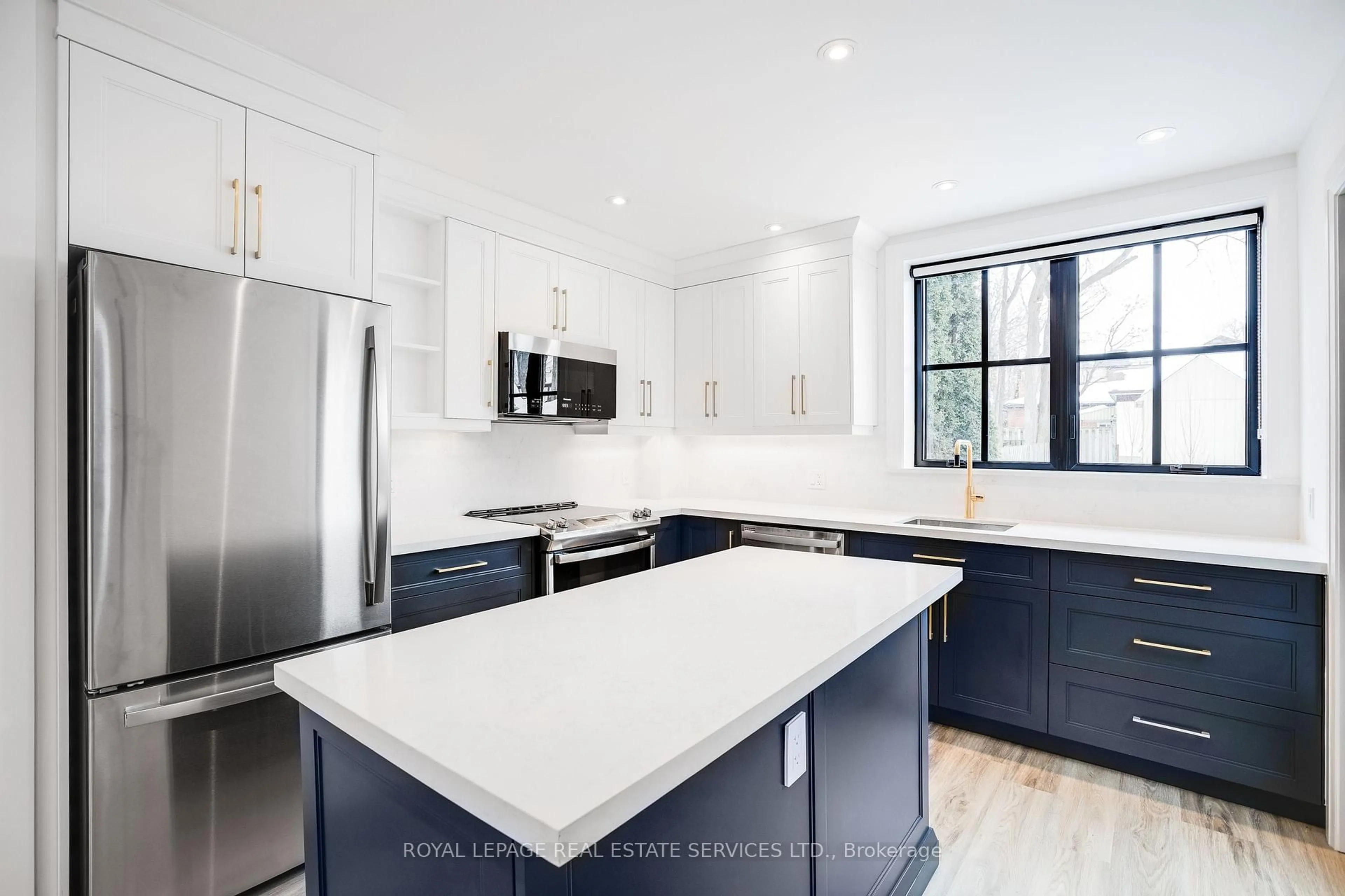 Open concept kitchen, ceramic/tile floor for 18 Milton St, Toronto Ontario M8Y 2X5