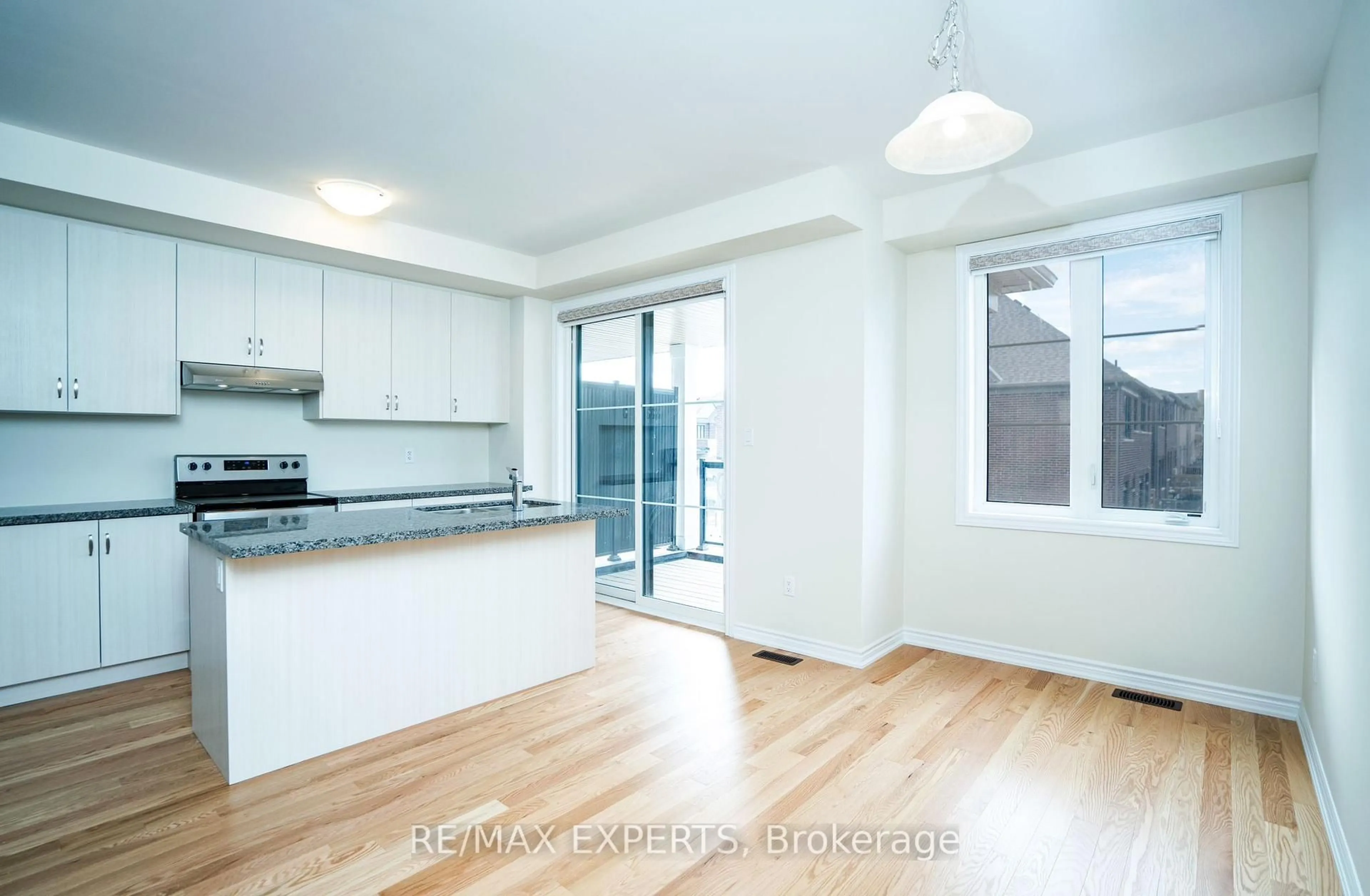 Open concept kitchen, wood/laminate floor for 1455 NATIONAL COMMON Cres, Burlington Ontario L7P 0V7