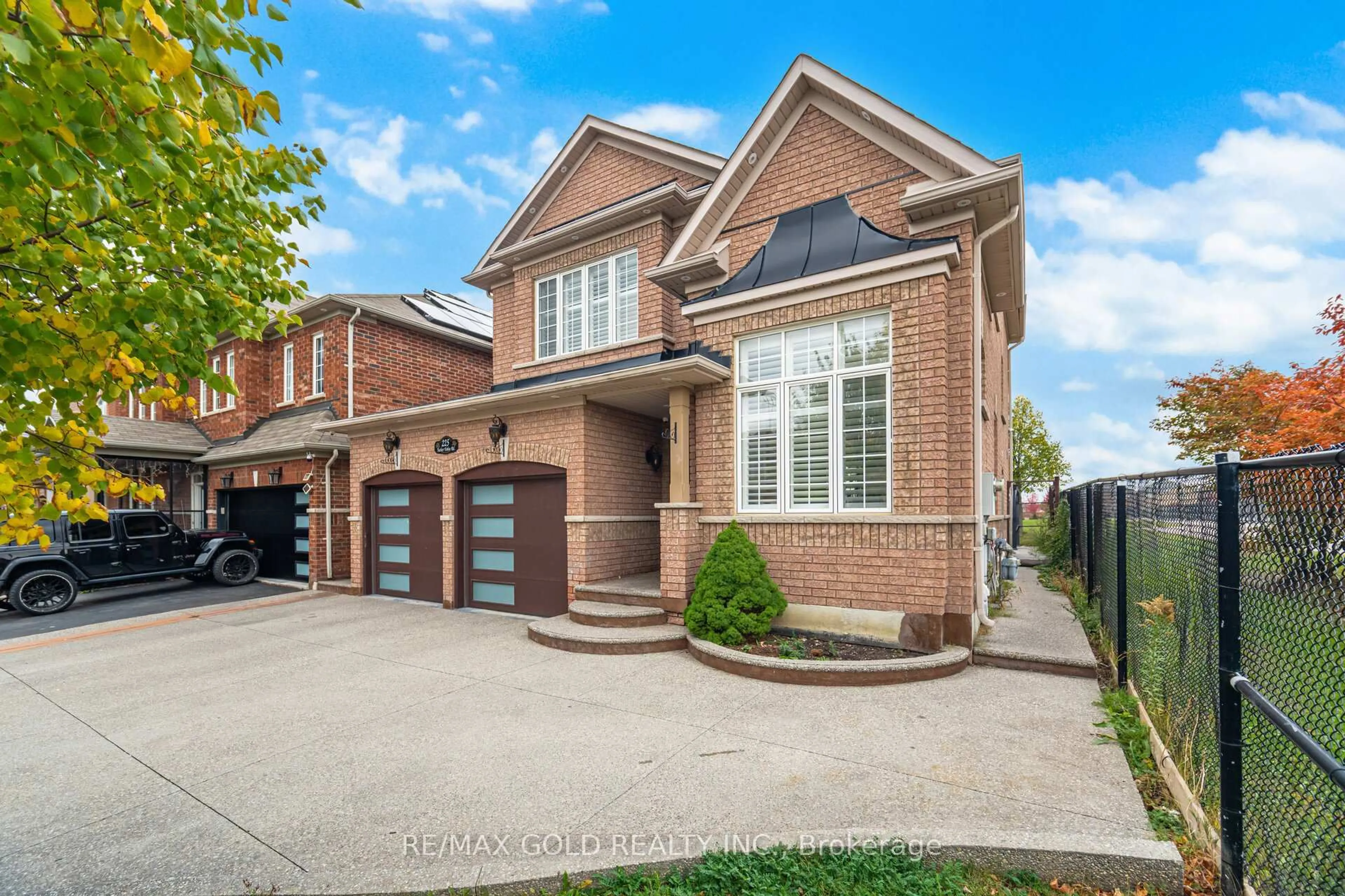 Home with brick exterior material, street for 225 Father Tobin Rd, Brampton Ontario L6R 0G3