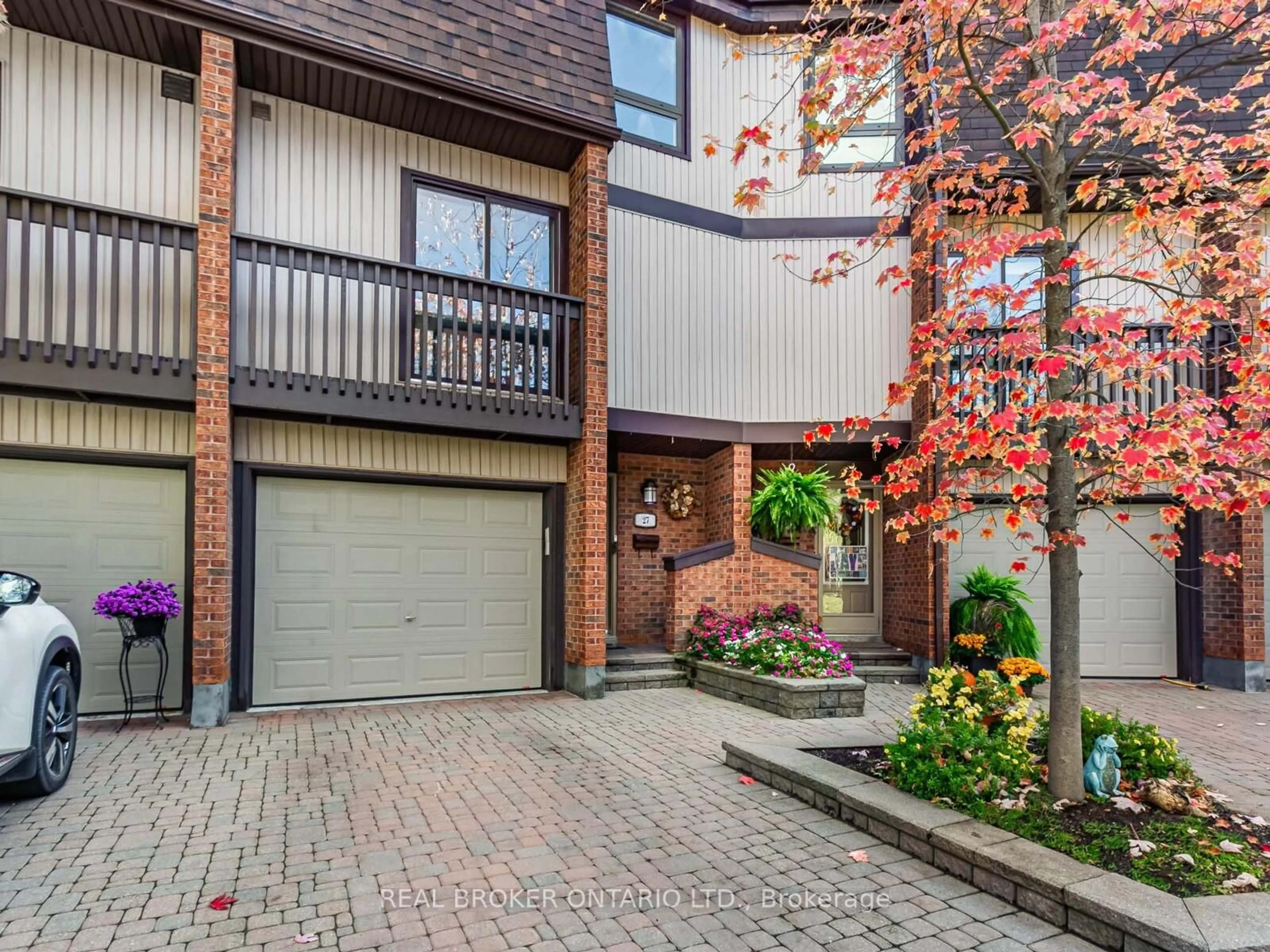 Home with brick exterior material, street for 1060 Walden Circ #27, Mississauga Ontario L5J 4J9