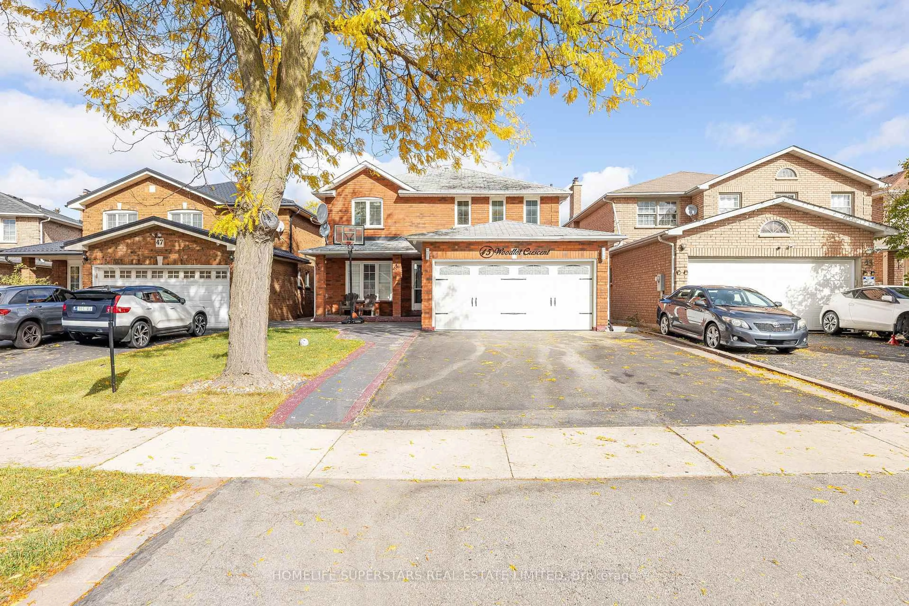 Home with brick exterior material, street for 45 Woodlot Cres, Toronto Ontario M9W 6T2