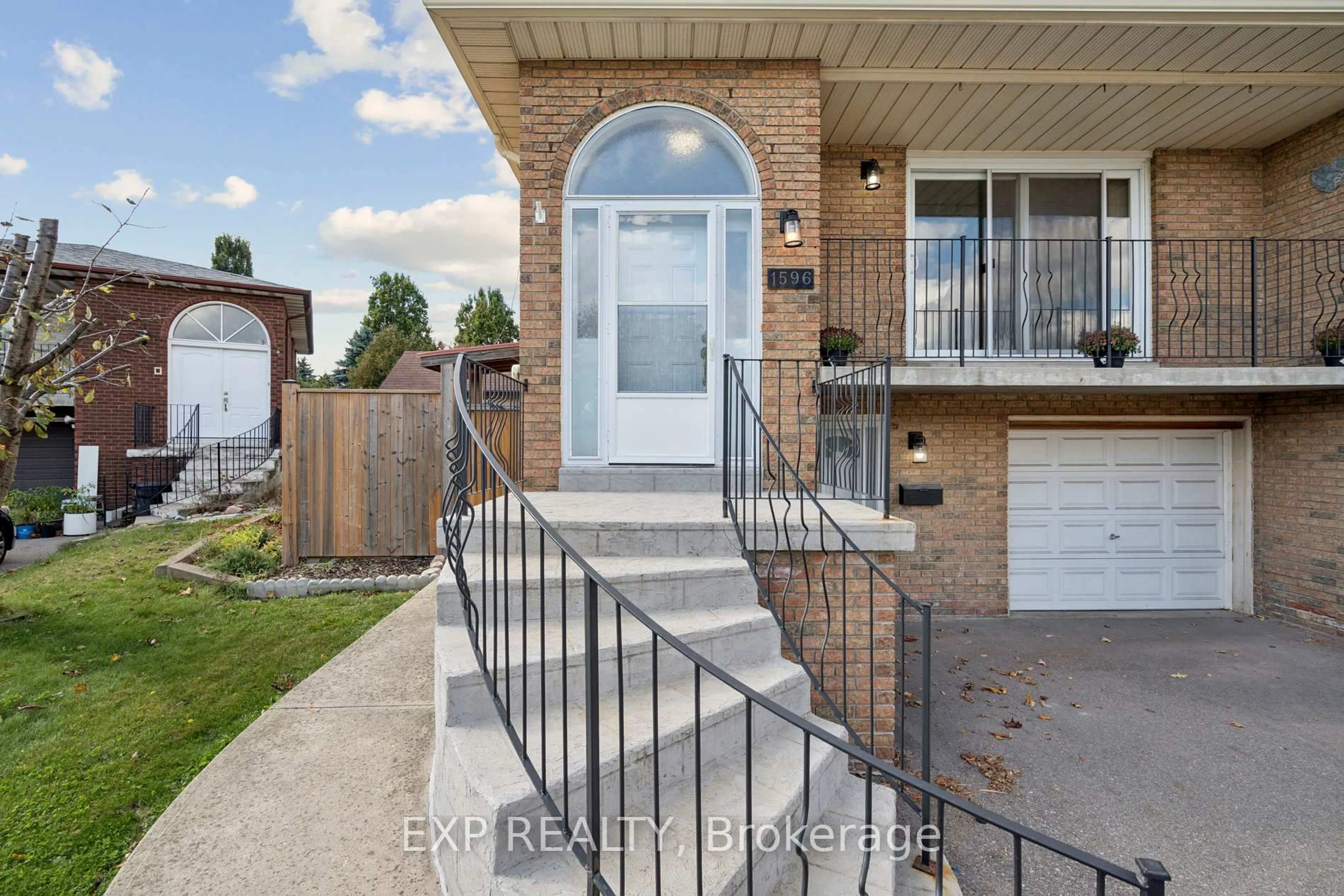 Home with brick exterior material, street for 1596 Corkstone Gl, Mississauga Ontario L4W 2E7