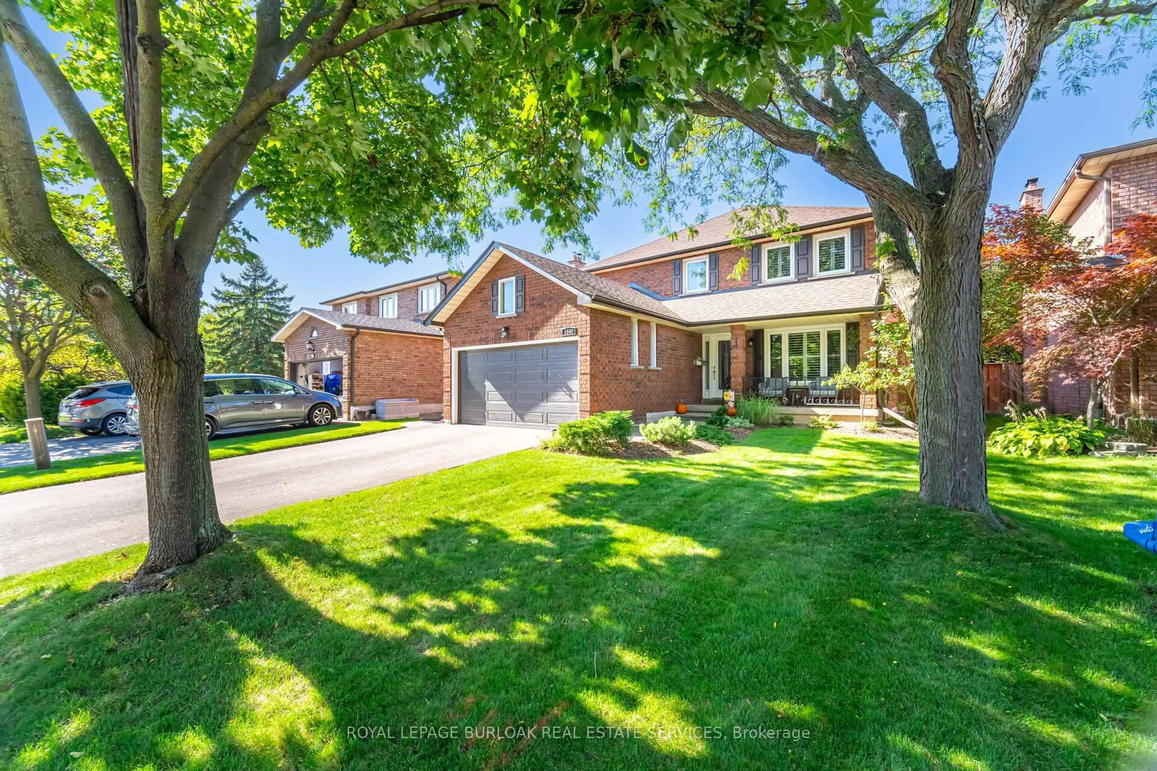 Home with brick exterior material, street for 1040 Manchester Cres, Oakville Ontario L6M 1G2