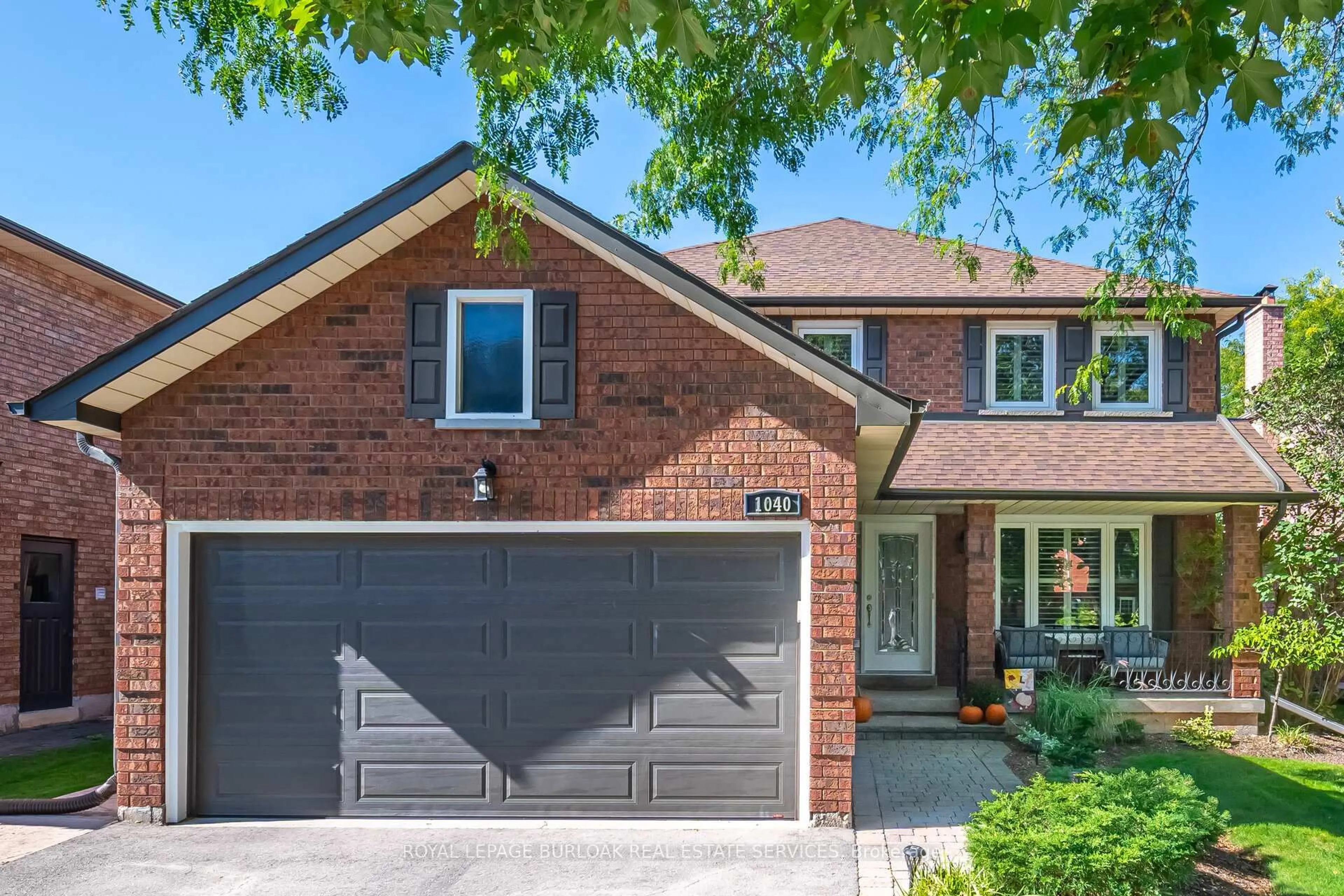 Home with brick exterior material, street for 1040 Manchester Cres, Oakville Ontario L6M 1G2