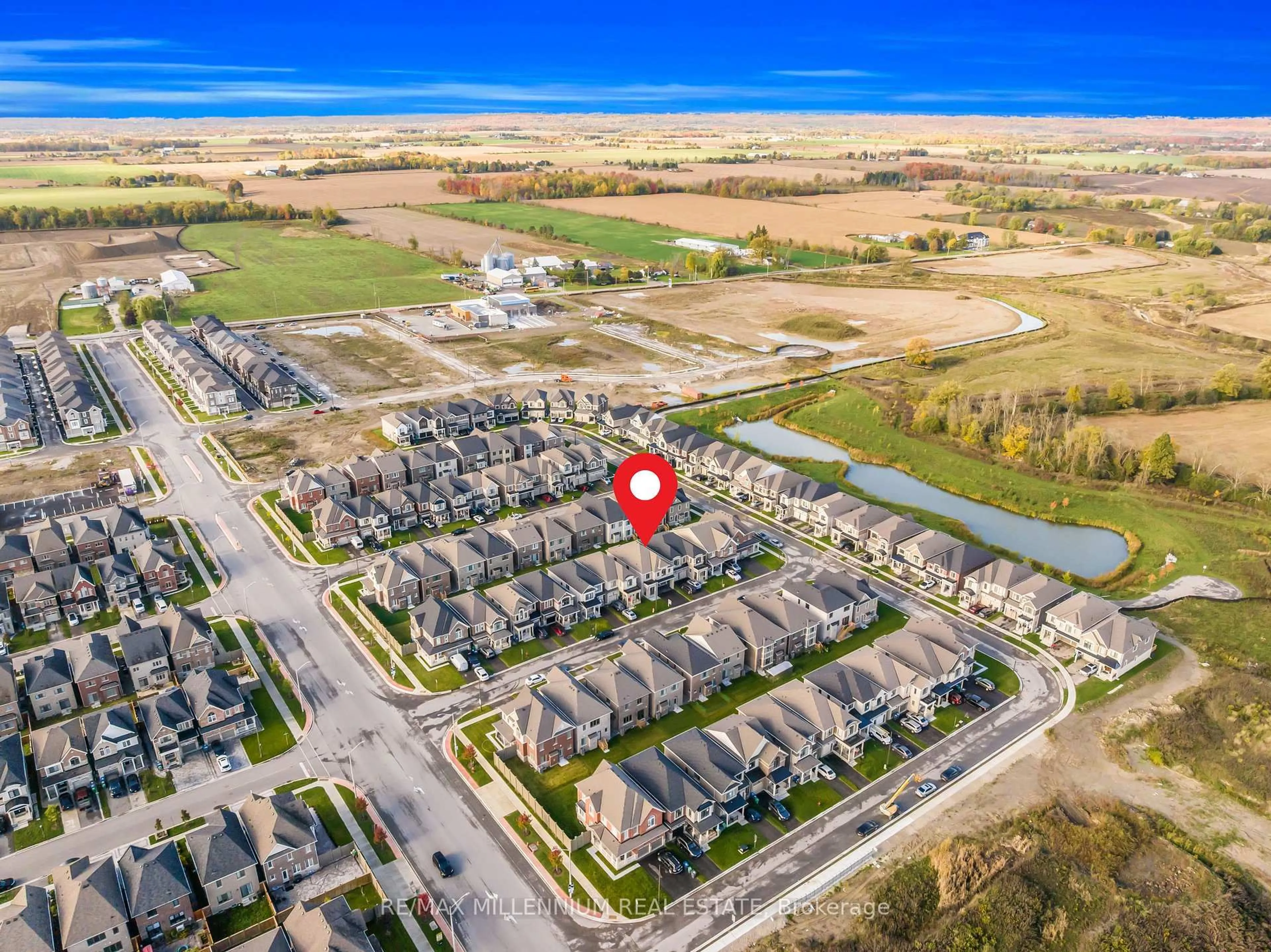 A pic from outside/outdoor area/front of a property/back of a property/a pic from drone, water/lake/river/ocean view for 14 Cloudberry St, Caledon Ontario L7C 3H1
