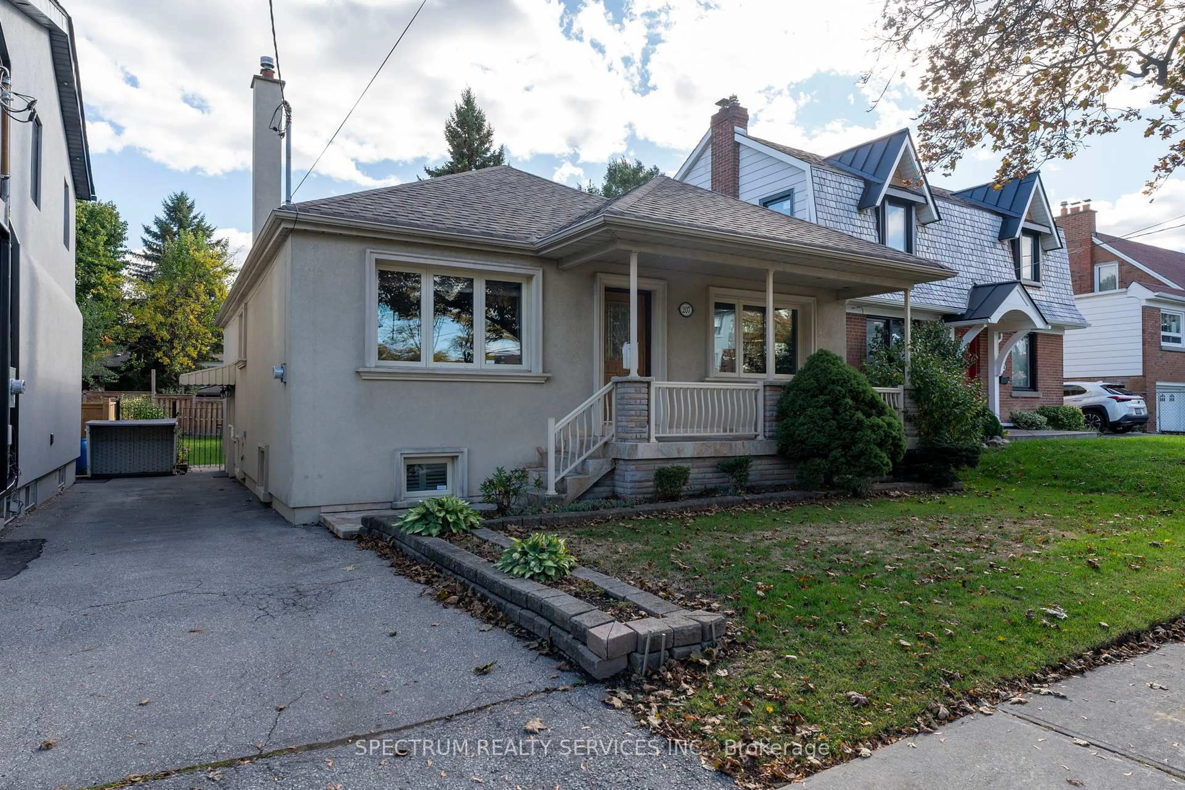 Home with vinyl exterior material, street for 207 Church St, Toronto Ontario M9N 1N9