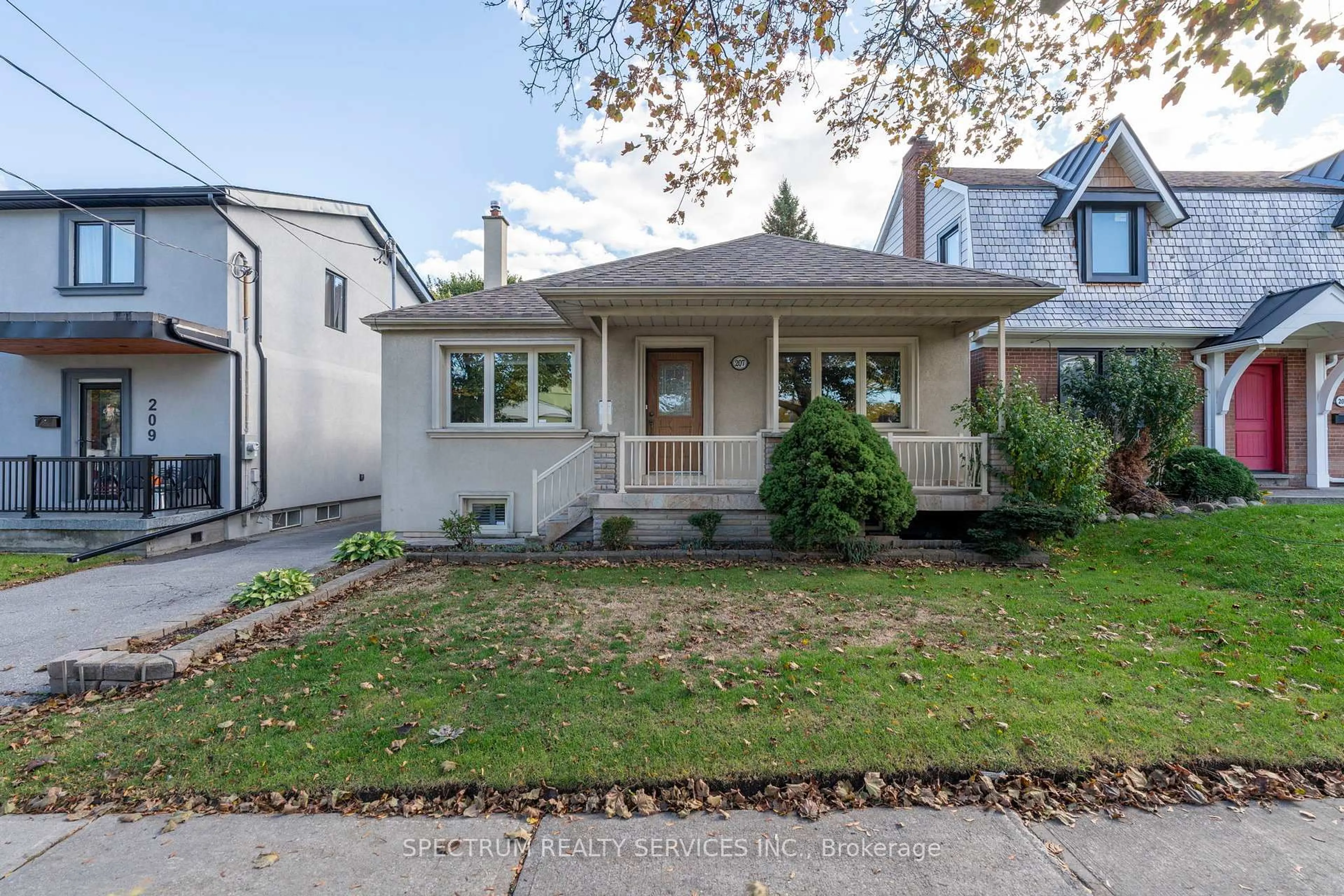 Home with vinyl exterior material, street for 207 Church St, Toronto Ontario M9N 1N9
