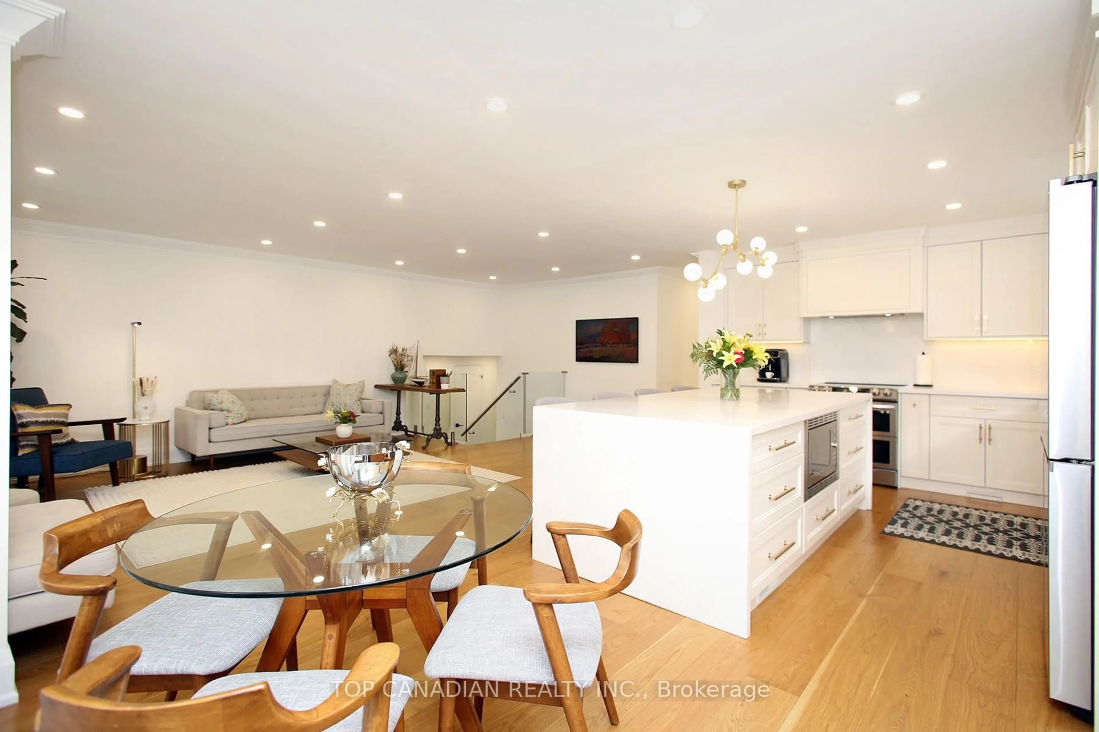 Contemporary kitchen, wood/laminate floor for 645 Castleguard Cres, Burlington Ontario L7N 2W7