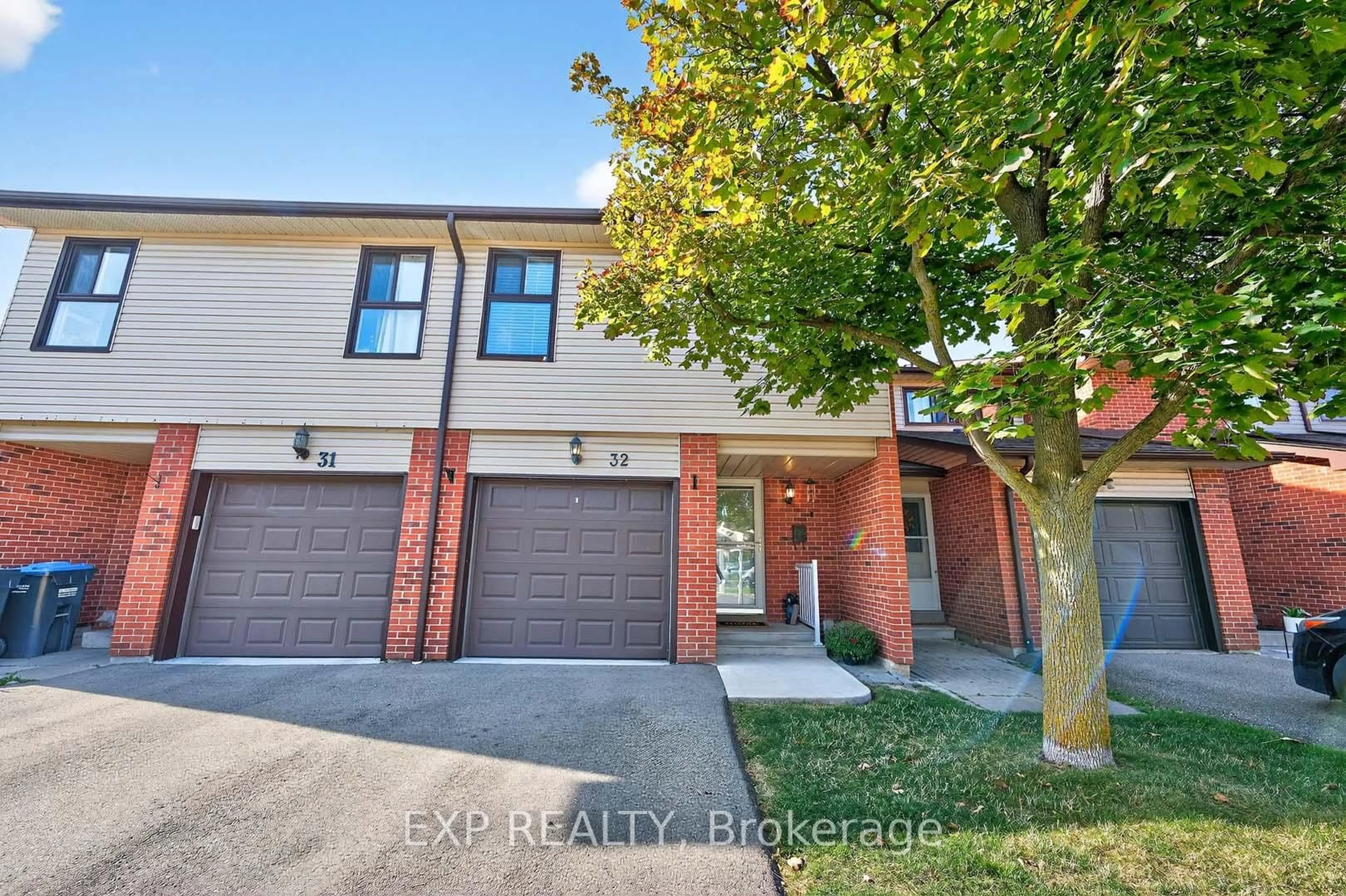 Home with brick exterior material, street for 32 Collins Cres, Brampton Ontario L6V 3M9