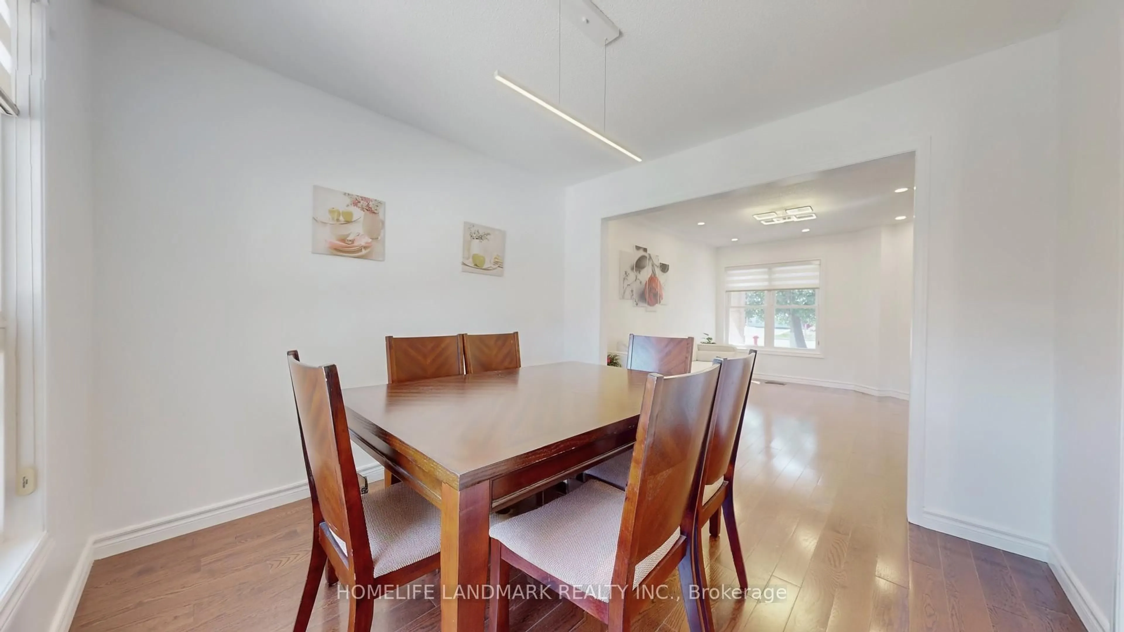 Dining room, wood/laminate floor for 373 Kingsbridge Garden Circ, Mississauga Ontario L5R 1K9