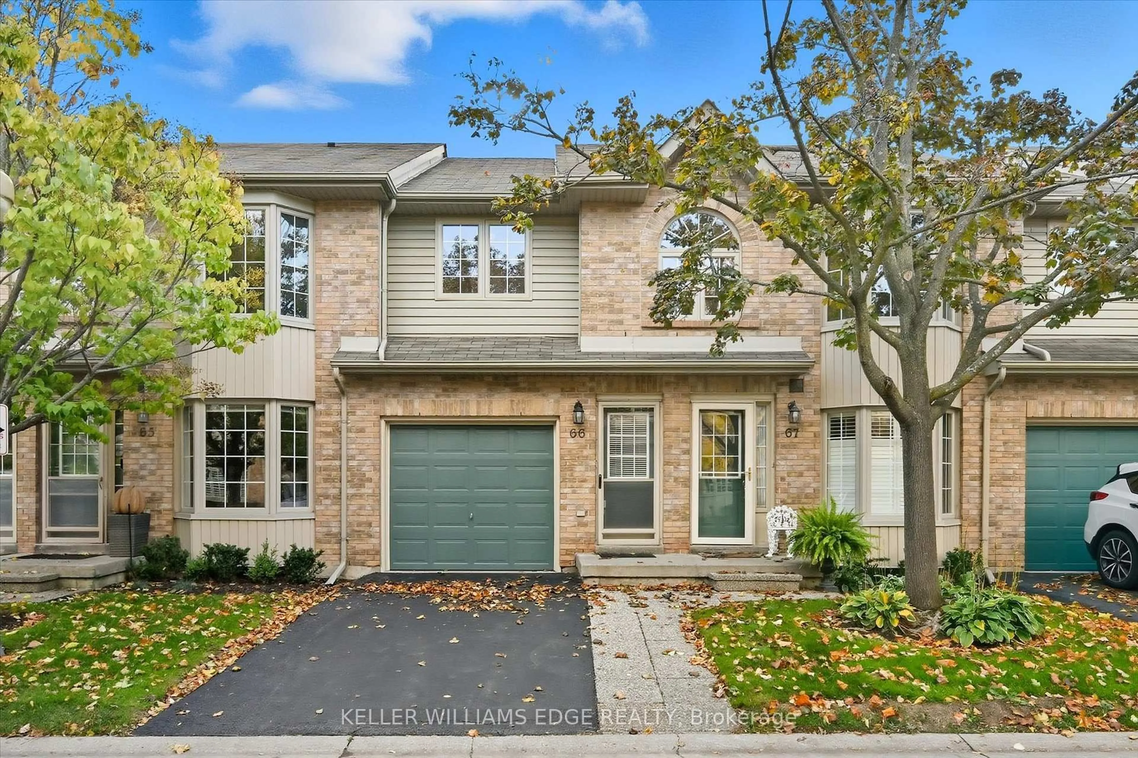 Home with brick exterior material, street for 3333 New St #66, Burlington Ontario L7N 1N1