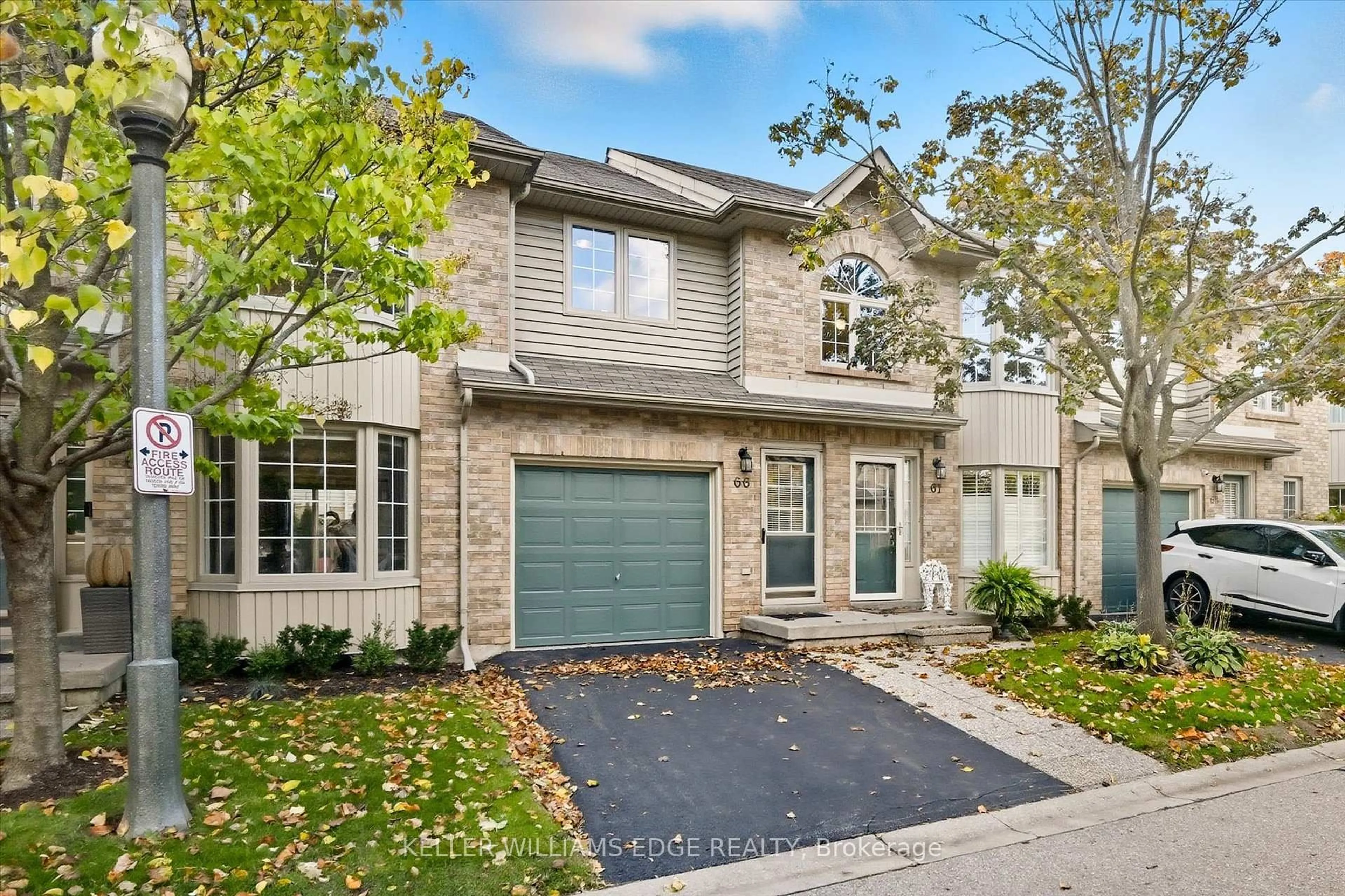 Home with brick exterior material, street for 3333 New St #66, Burlington Ontario L7N 1N1
