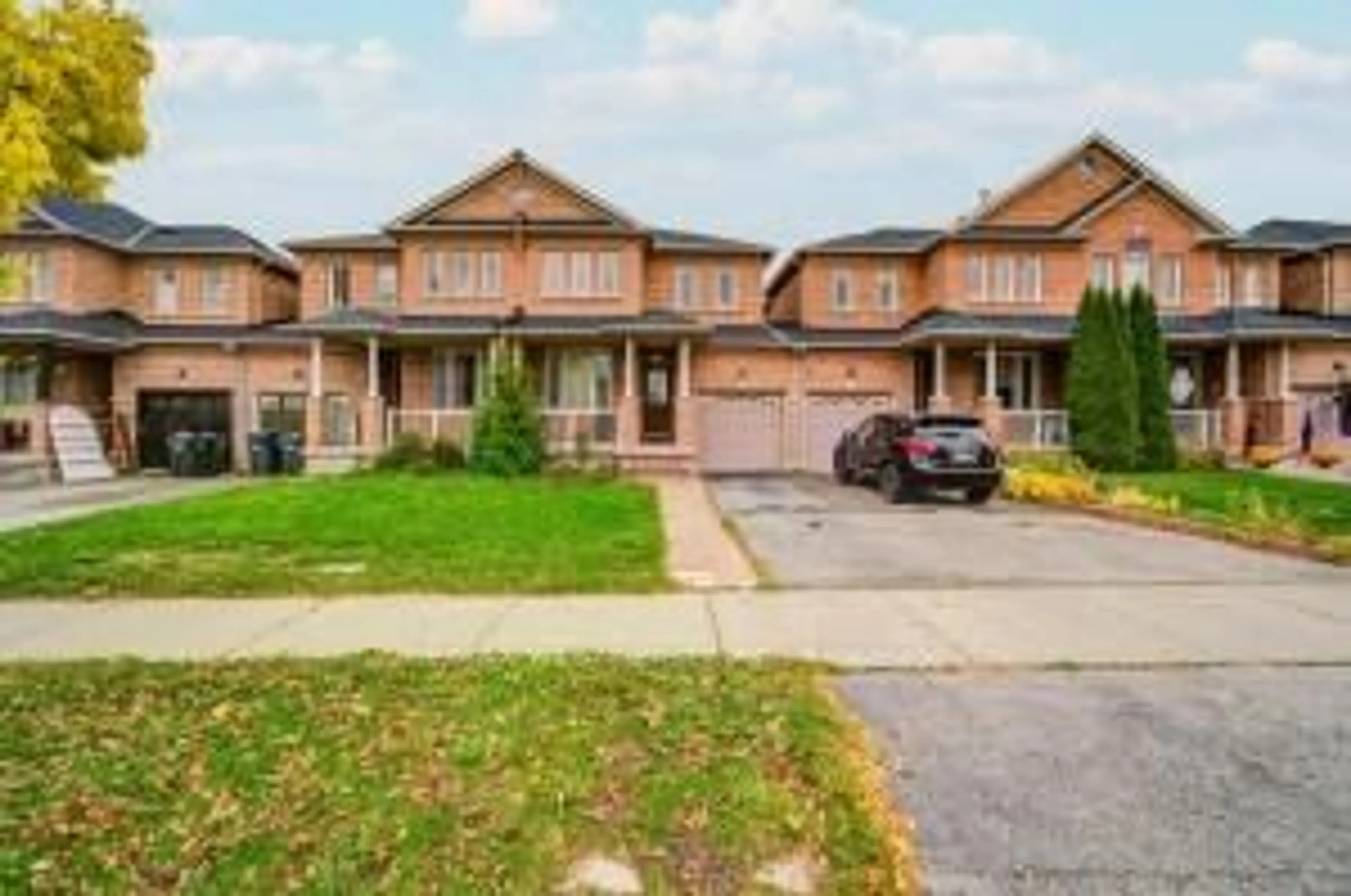 Home with brick exterior material, street for 12 Eaglefield Gate, Brampton Ontario L7A 3S2