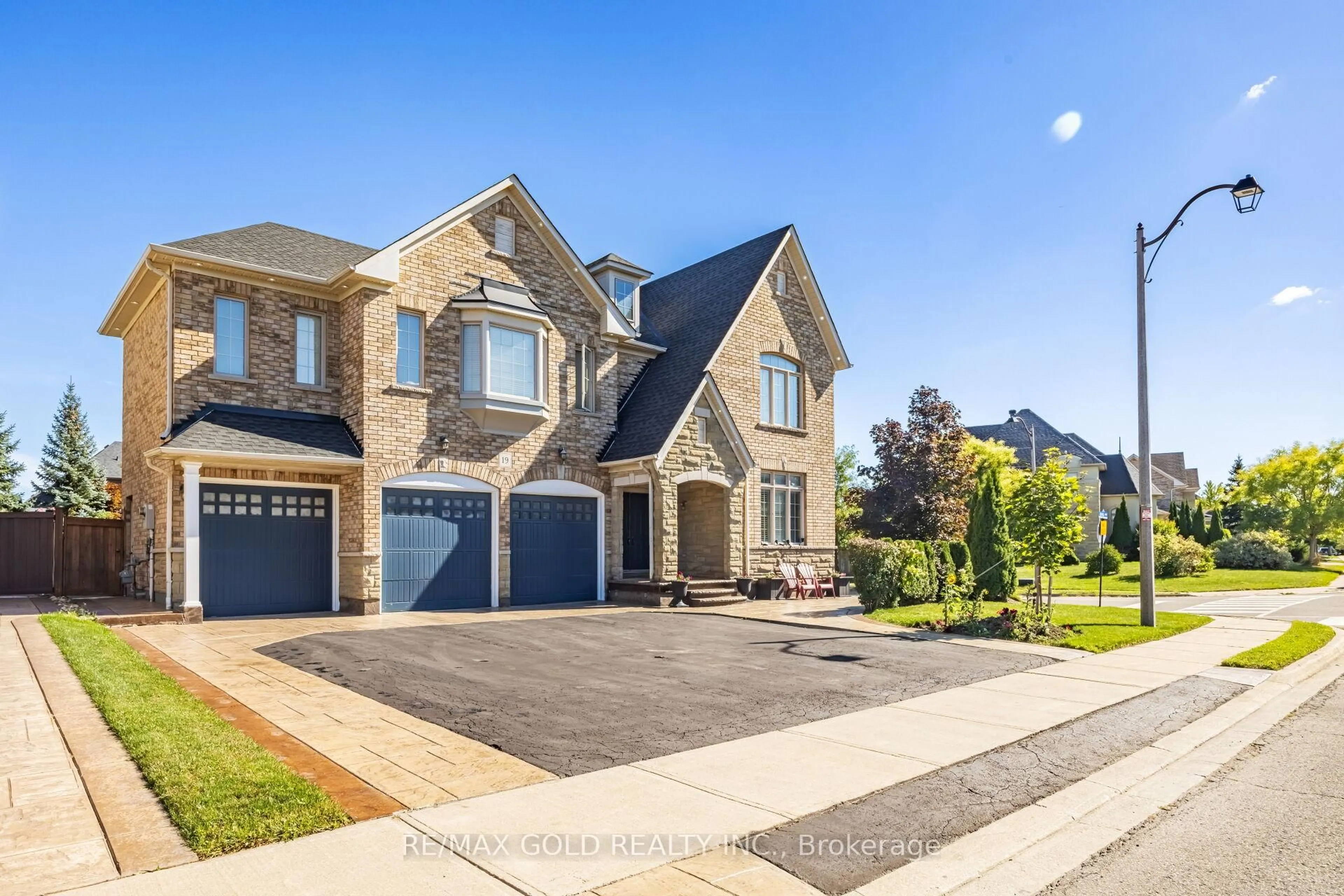 Home with brick exterior material, street for 19 Eiffel Blvd, Brampton Ontario L6P 1W2