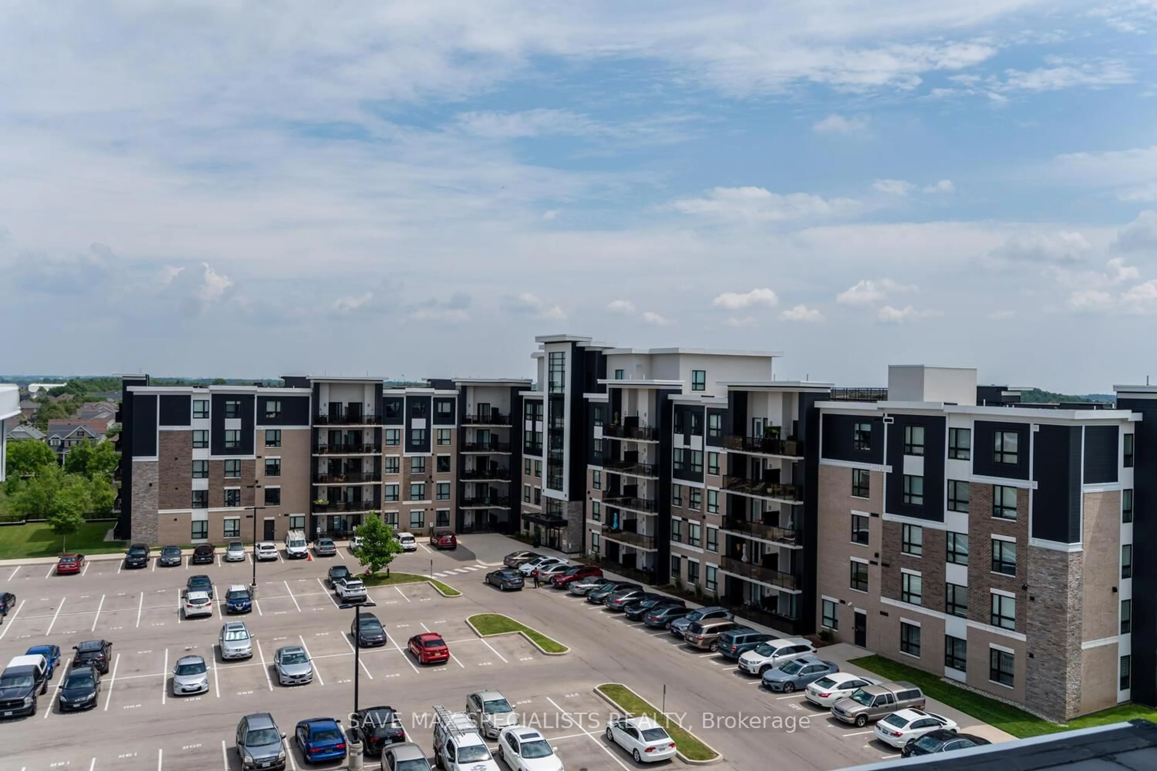 A pic from outside/outdoor area/front of a property/back of a property/a pic from drone, unknown for 640 Sauve St #422, Milton Ontario L9T 8M4
