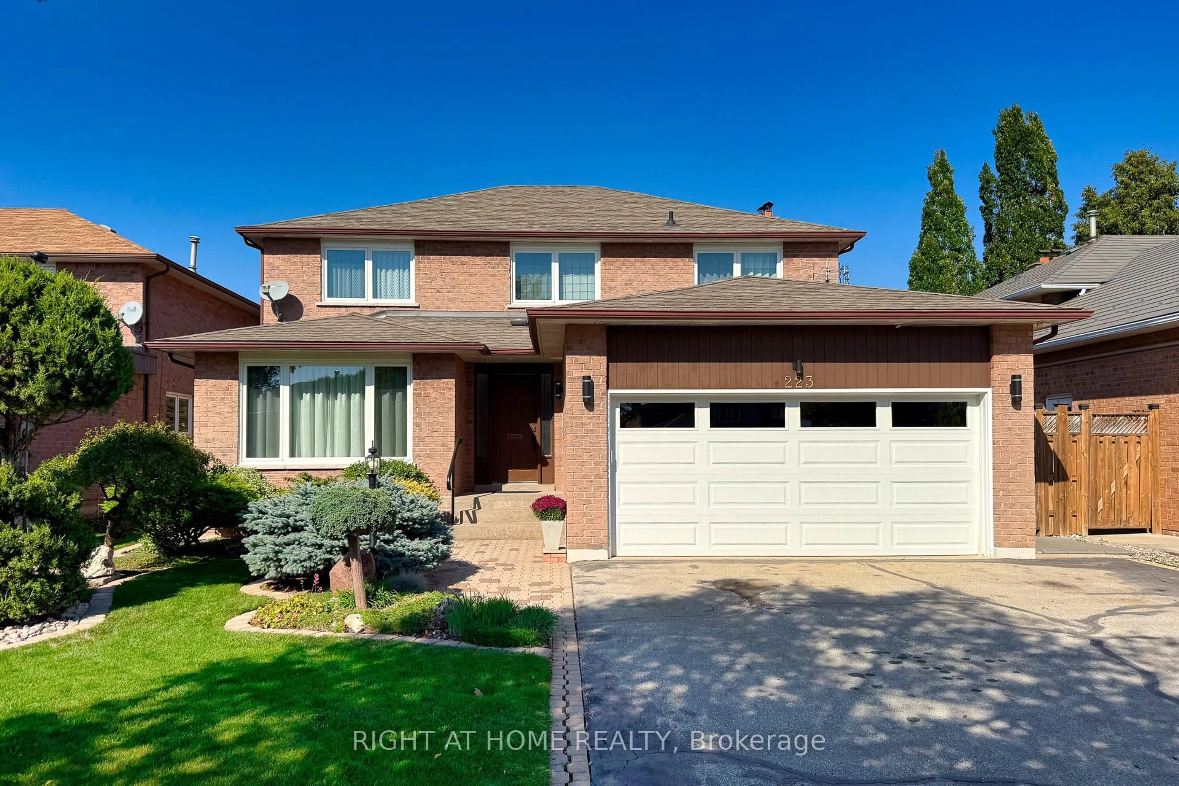 Home with brick exterior material, street for 223 River Oaks Blvd, Oakville Ontario L6H 3V2