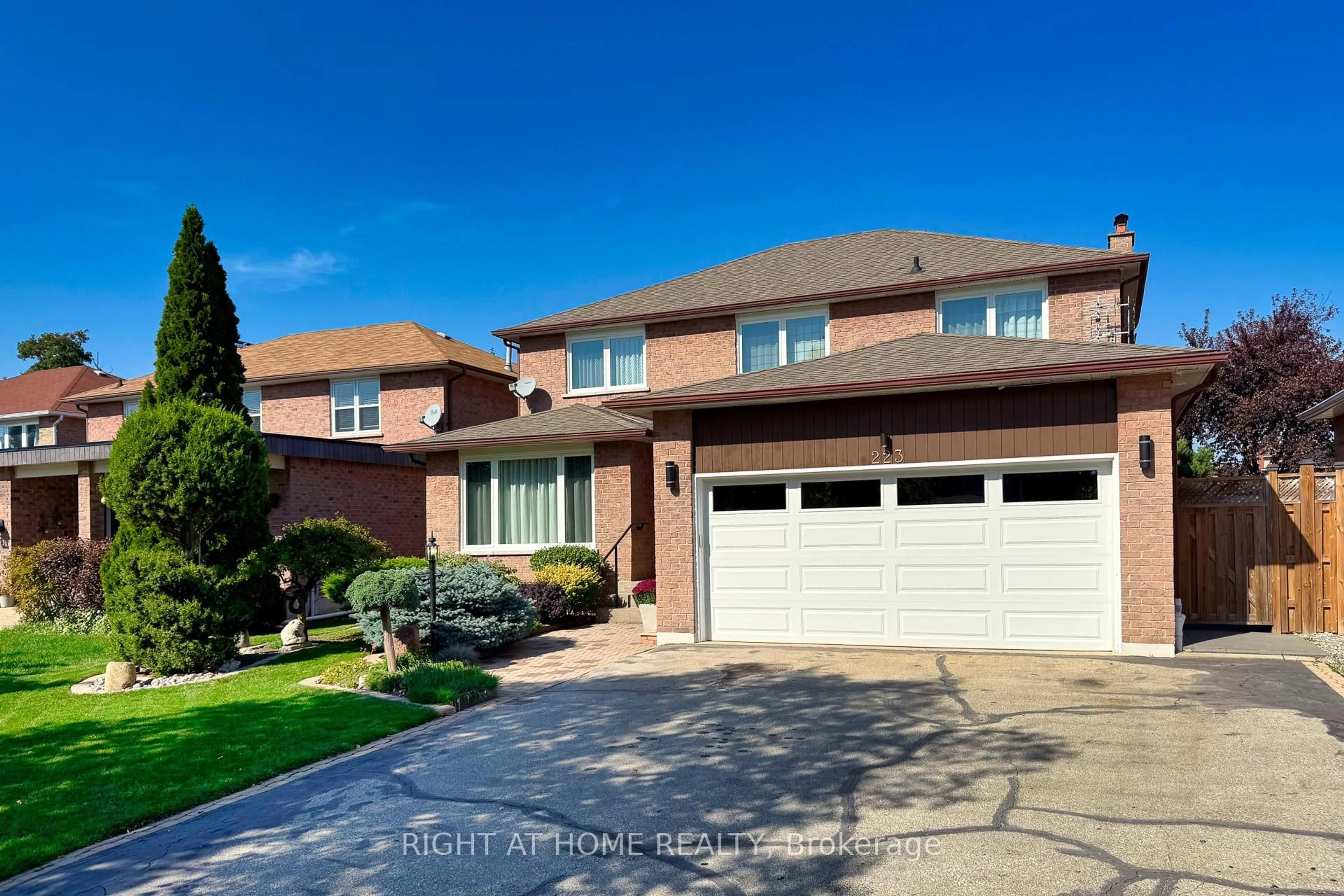 Home with brick exterior material, street for 223 River Oaks Blvd, Oakville Ontario L6H 3V2