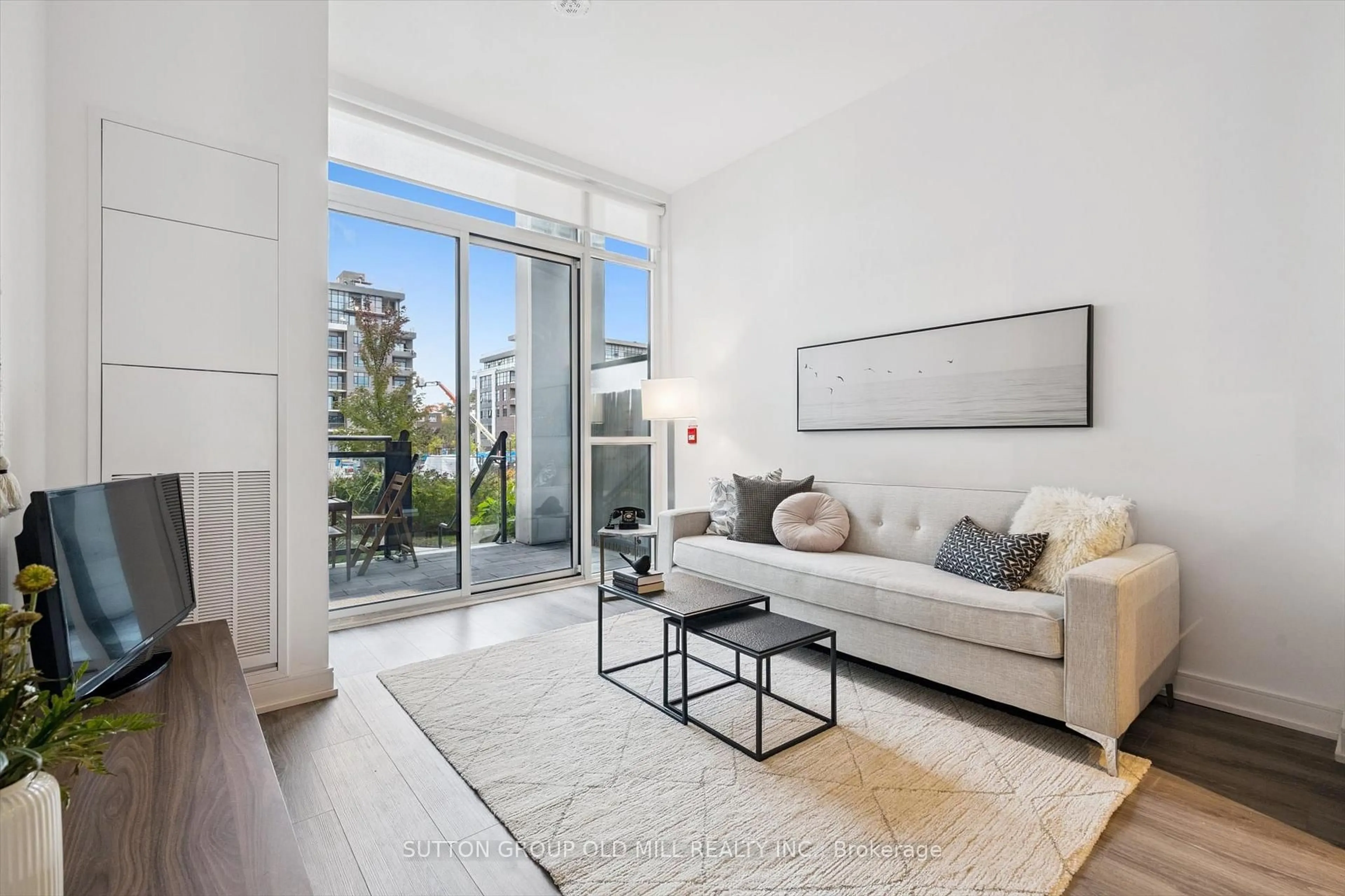 Living room with furniture, unknown for 25 Neighbourhood Lane #101, Toronto Ontario M6P 1Z9